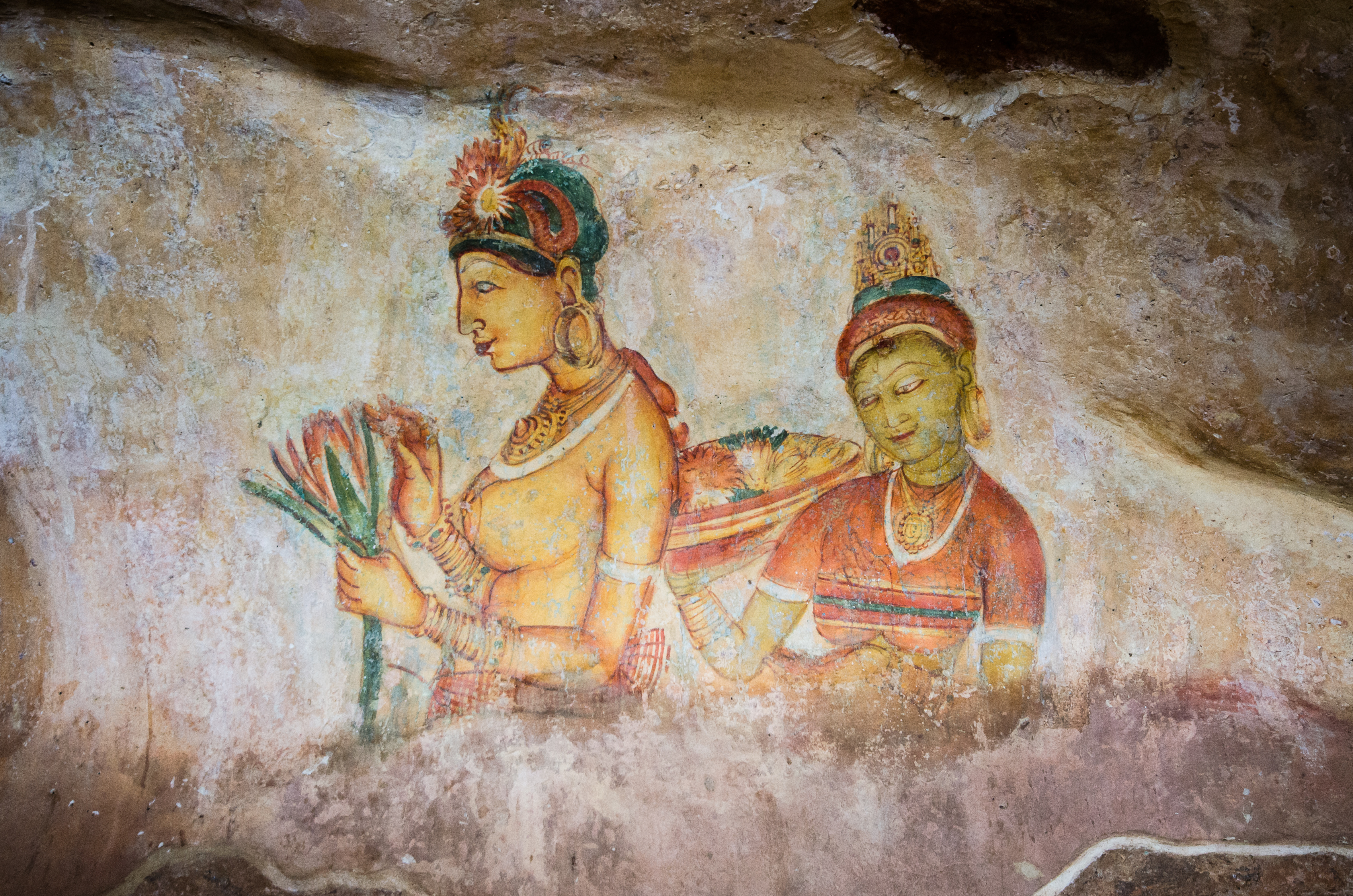 See the writing & frescoes of Sigiriya Mirror Wall