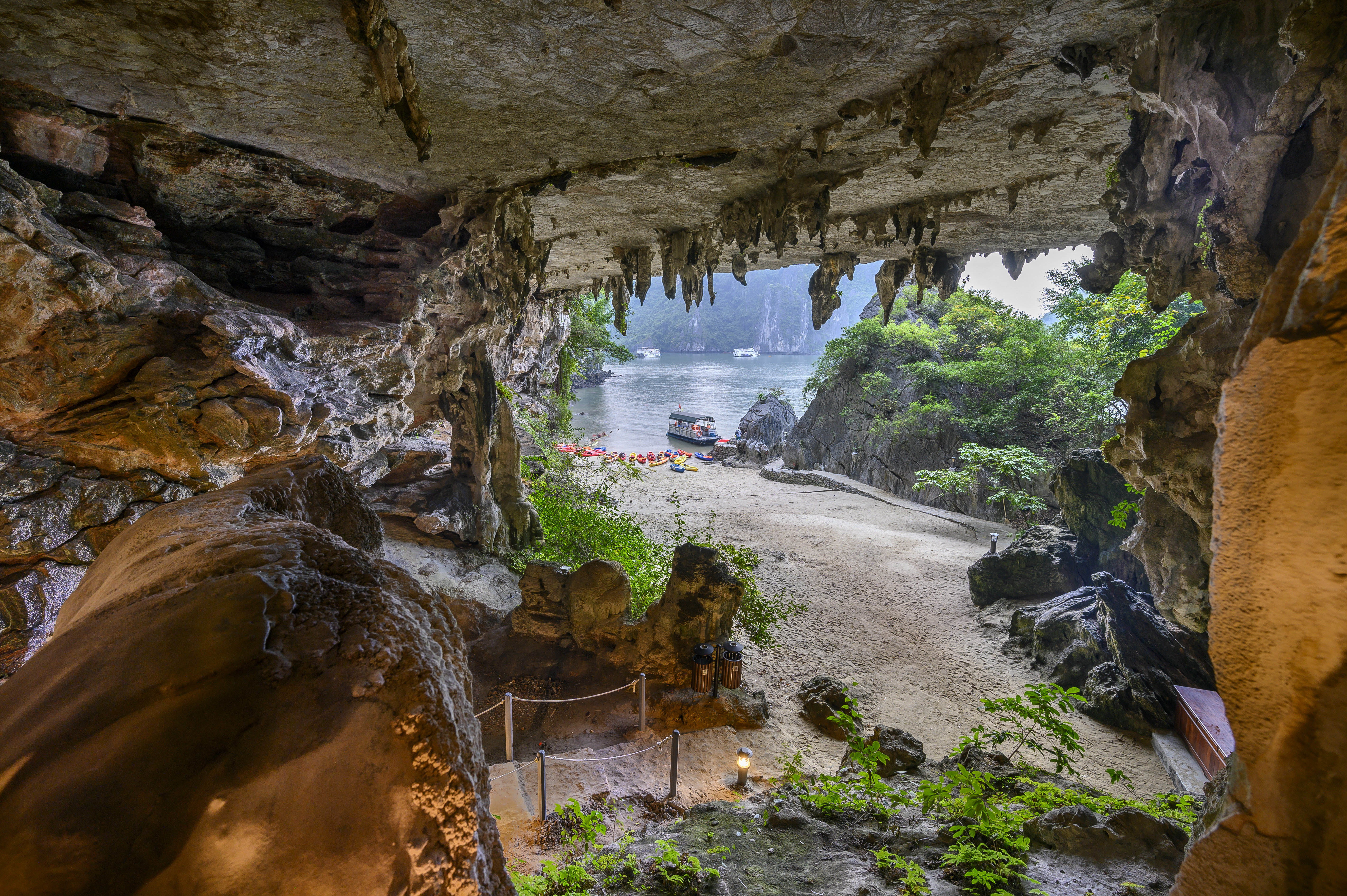 Explore the caves and beaches of Halong Bay