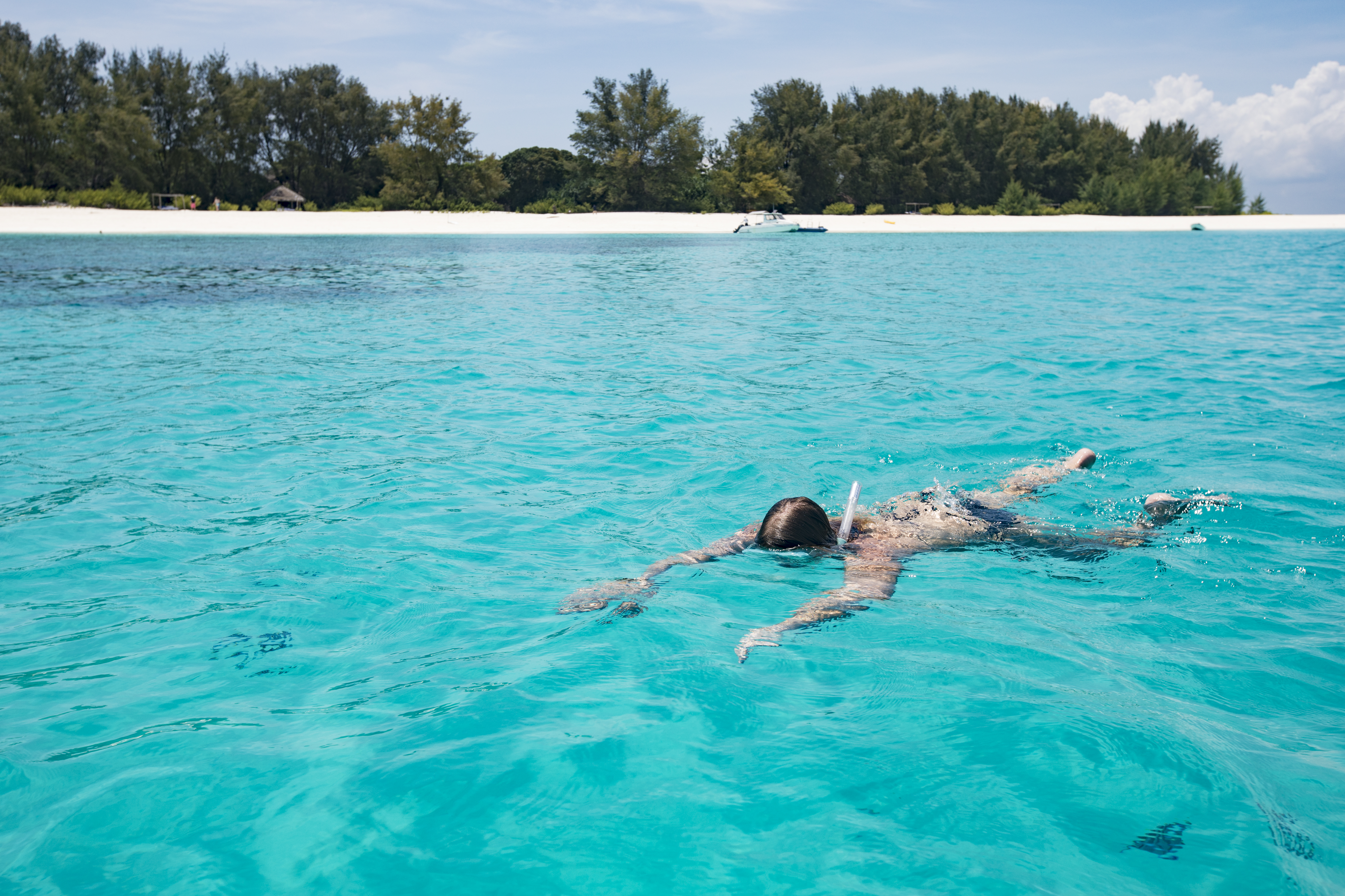 Snorkel the tropical coral reefs around Stone Town