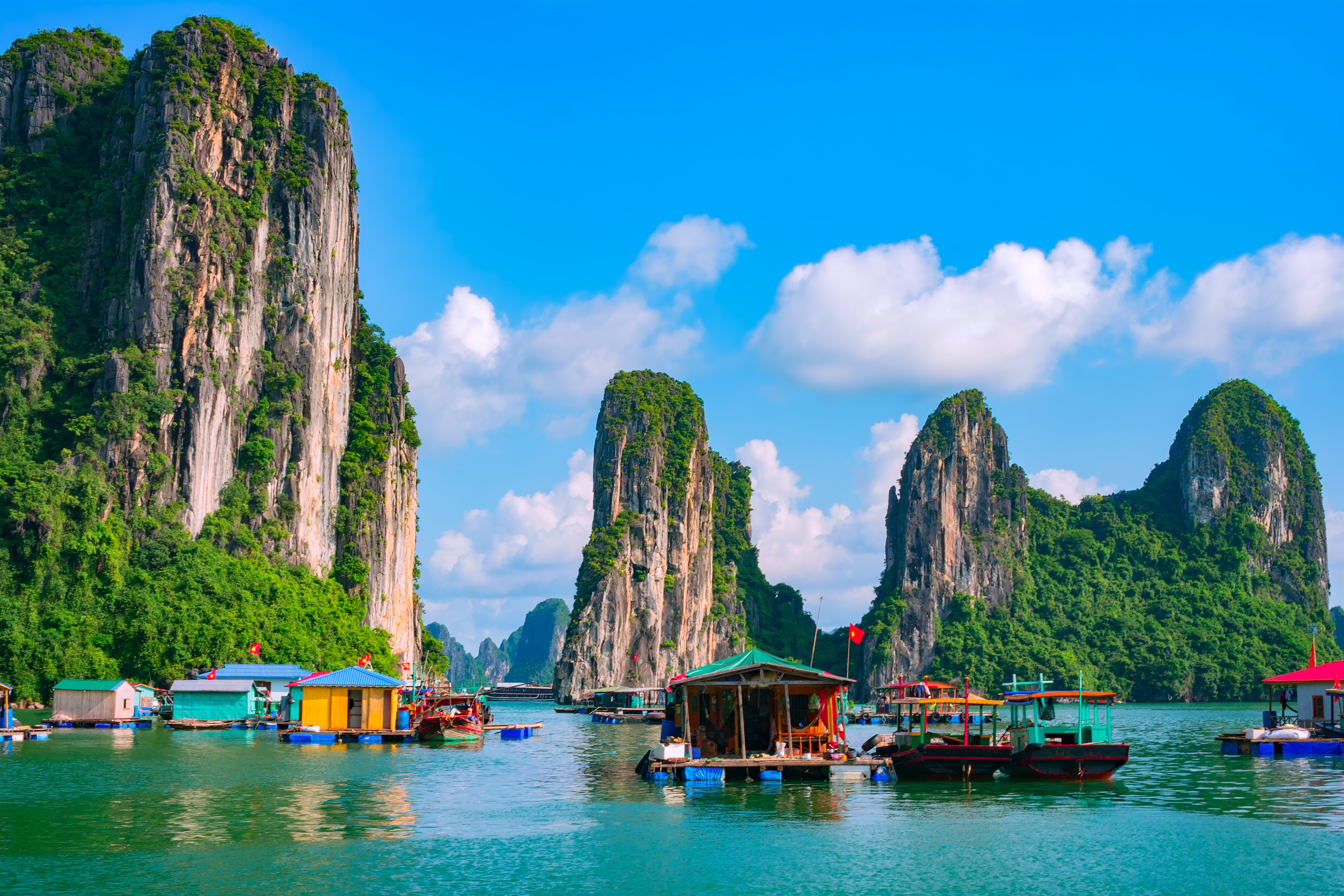 Visit a floating fishing village in Halong Bay