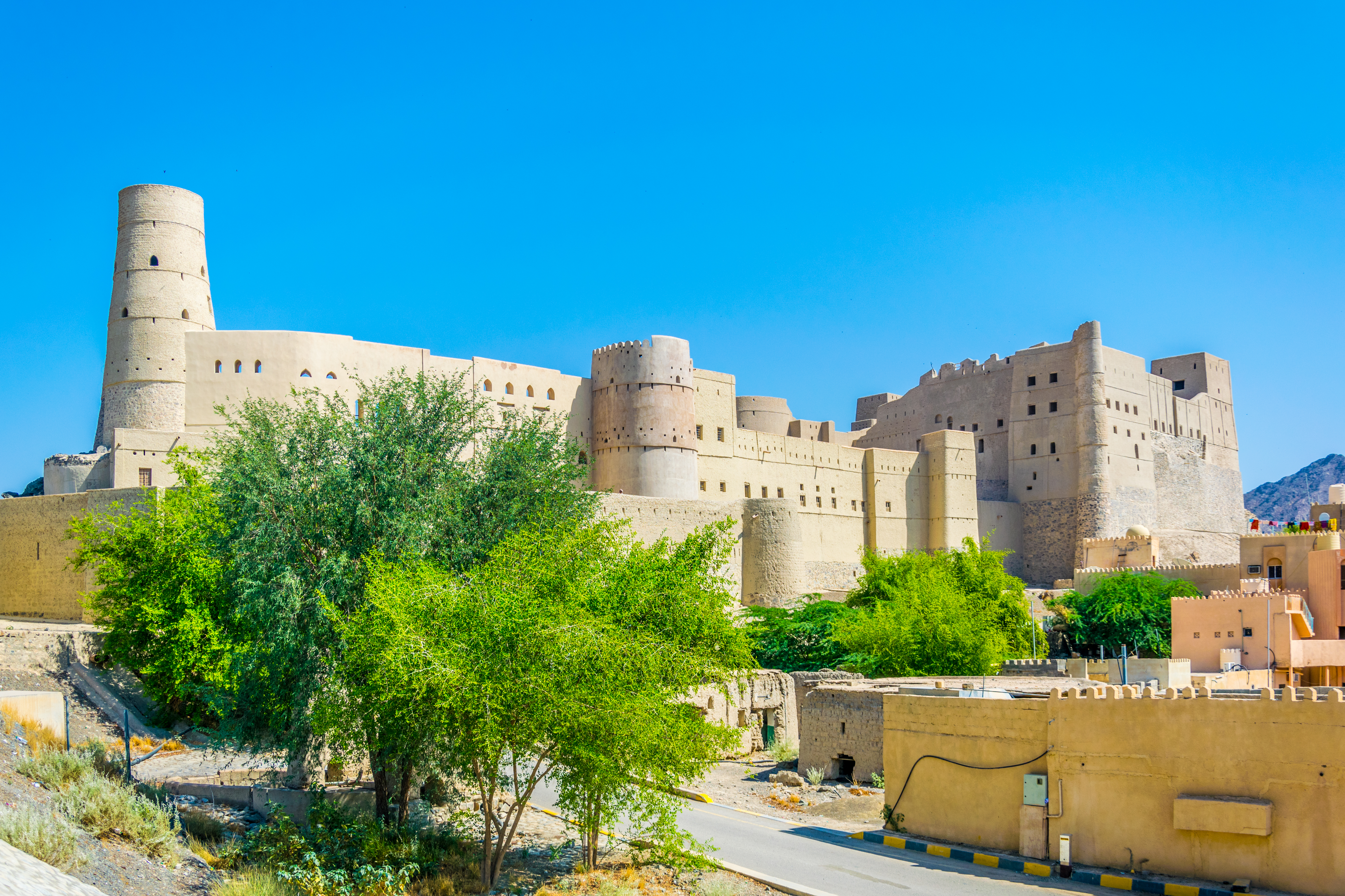 Visit the formidable Bahla Fort in Nizwa
