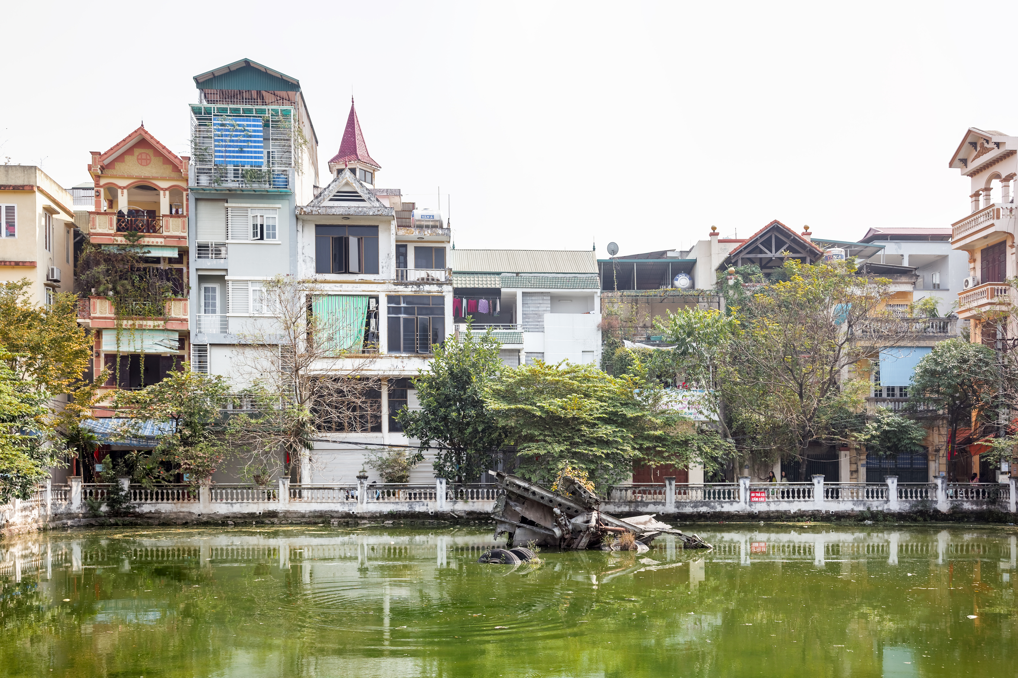 See the historic wreckage at Huu Tiep Lake, Hanoi
