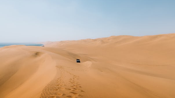 Go for a sundowner drive on the Roaring Dunes