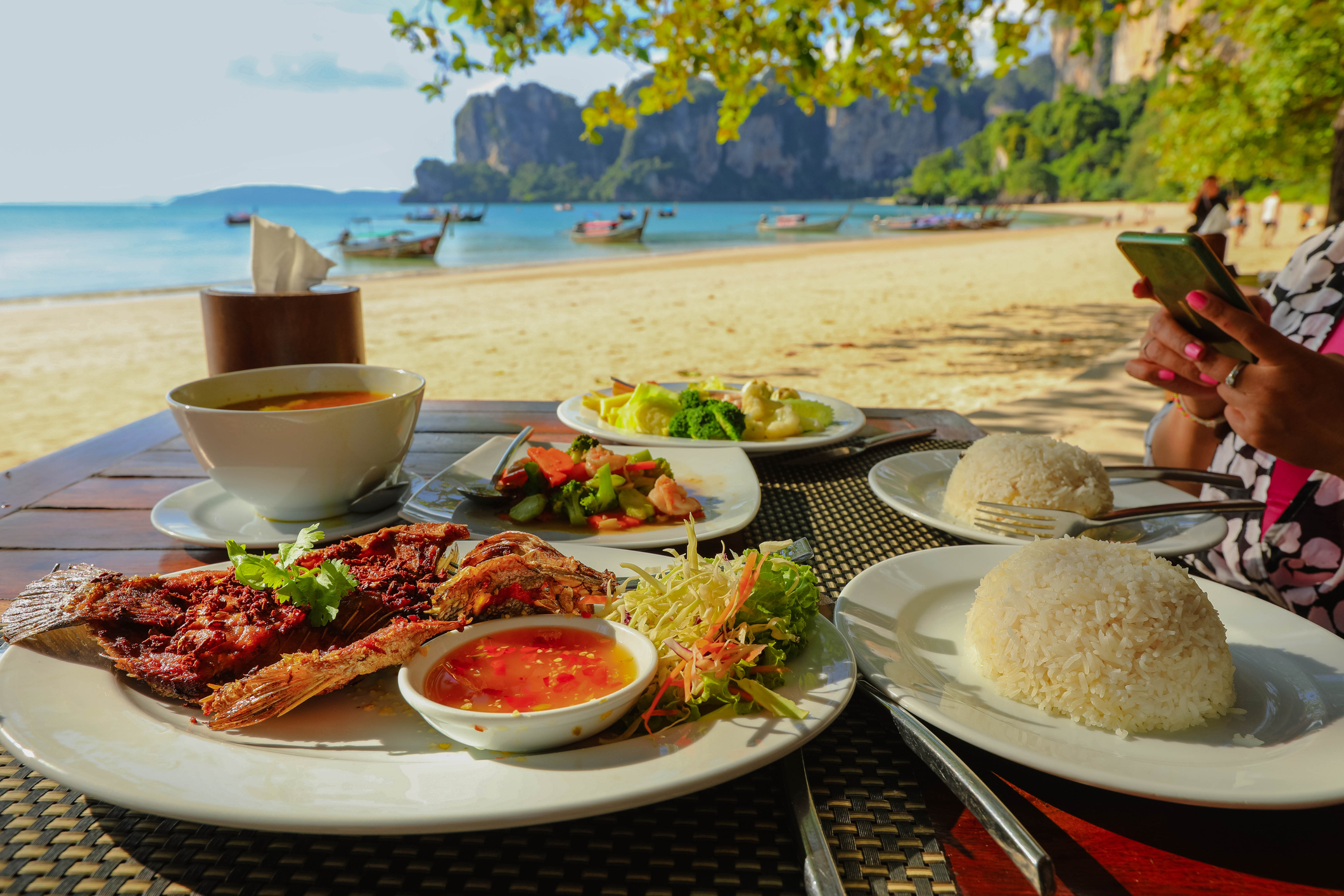Enjoy a delicious Thai lunch on the beach