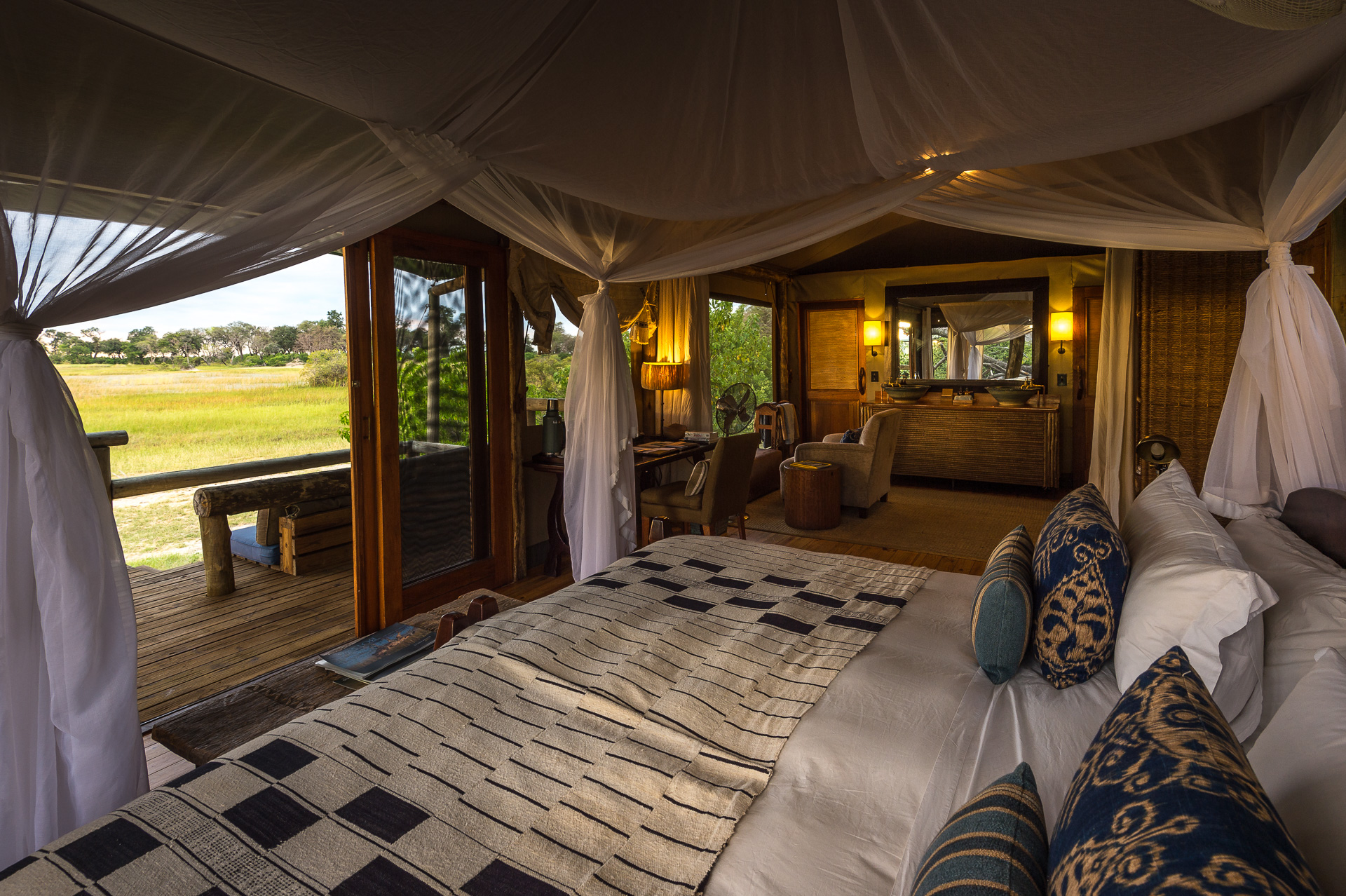 Bedroom and view from Little Vumbura tent