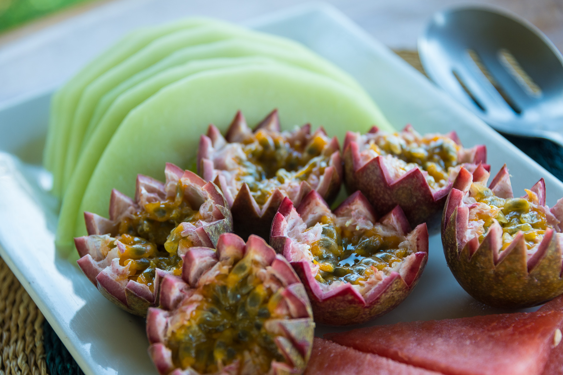Delicious fruit salad with melon and passionfruit