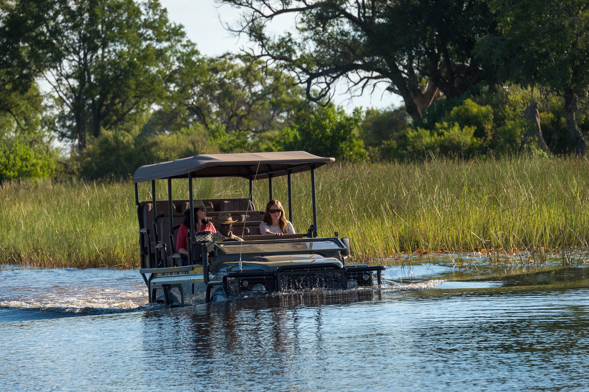 Intrepid vehicles cross the channels with ease during a game drive