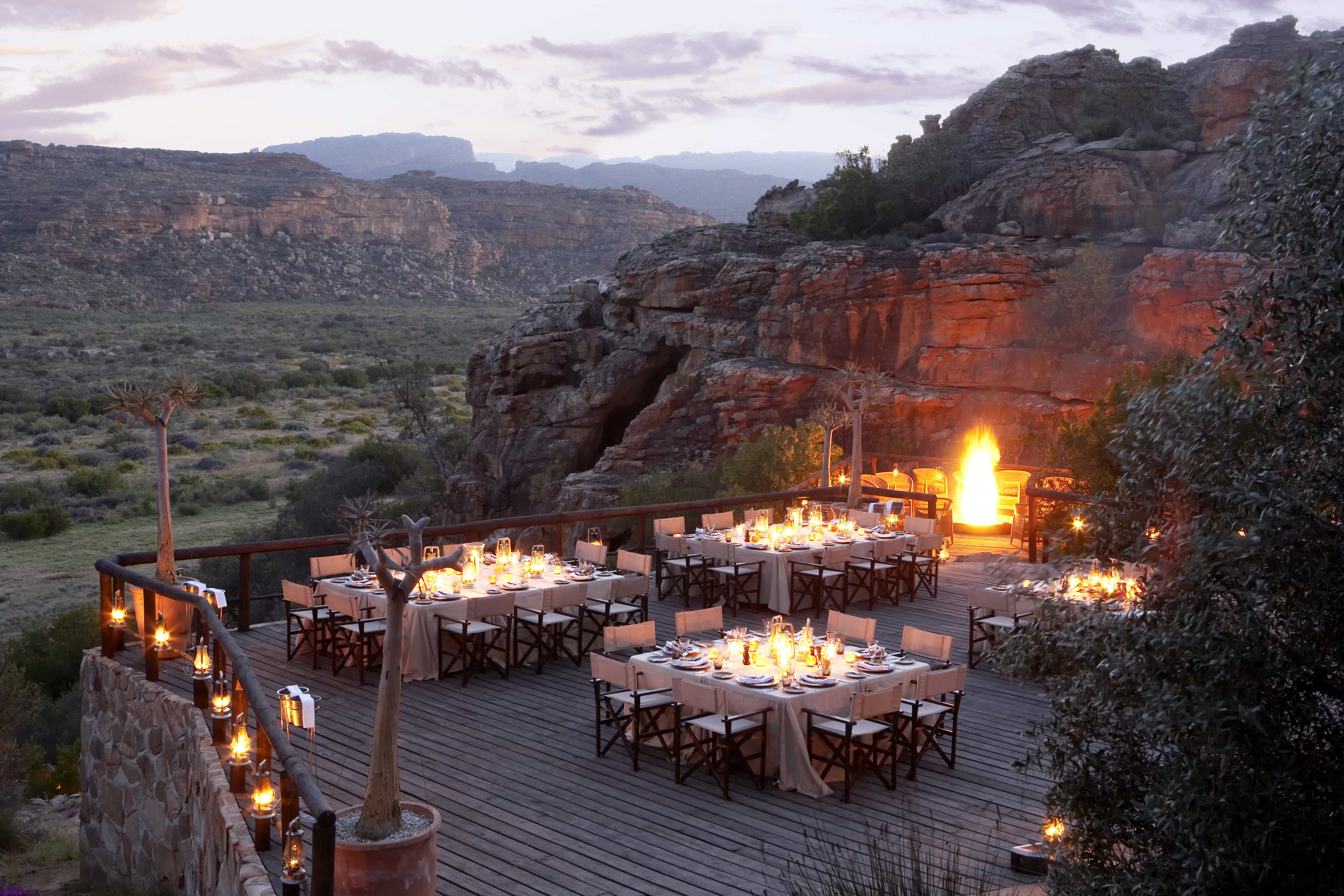 An extraordinary location under African skies, Embers is built into a natural ancient sandstone amphitheatre of giant boulders overlooking dramatic cliffs and valleys, and lit up by a roaring fire and hundreds of candles and lanterns. Guests are spoilt for choice with a South African salad buffet and home-baked breads, a choice of grills which includes Karoo lamb, traditional sausage, succulent steaks and chicken kebabs, and of course delectable desserts.