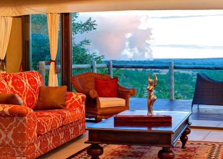 The main lounge area with views of the spray of the Victoria Falls