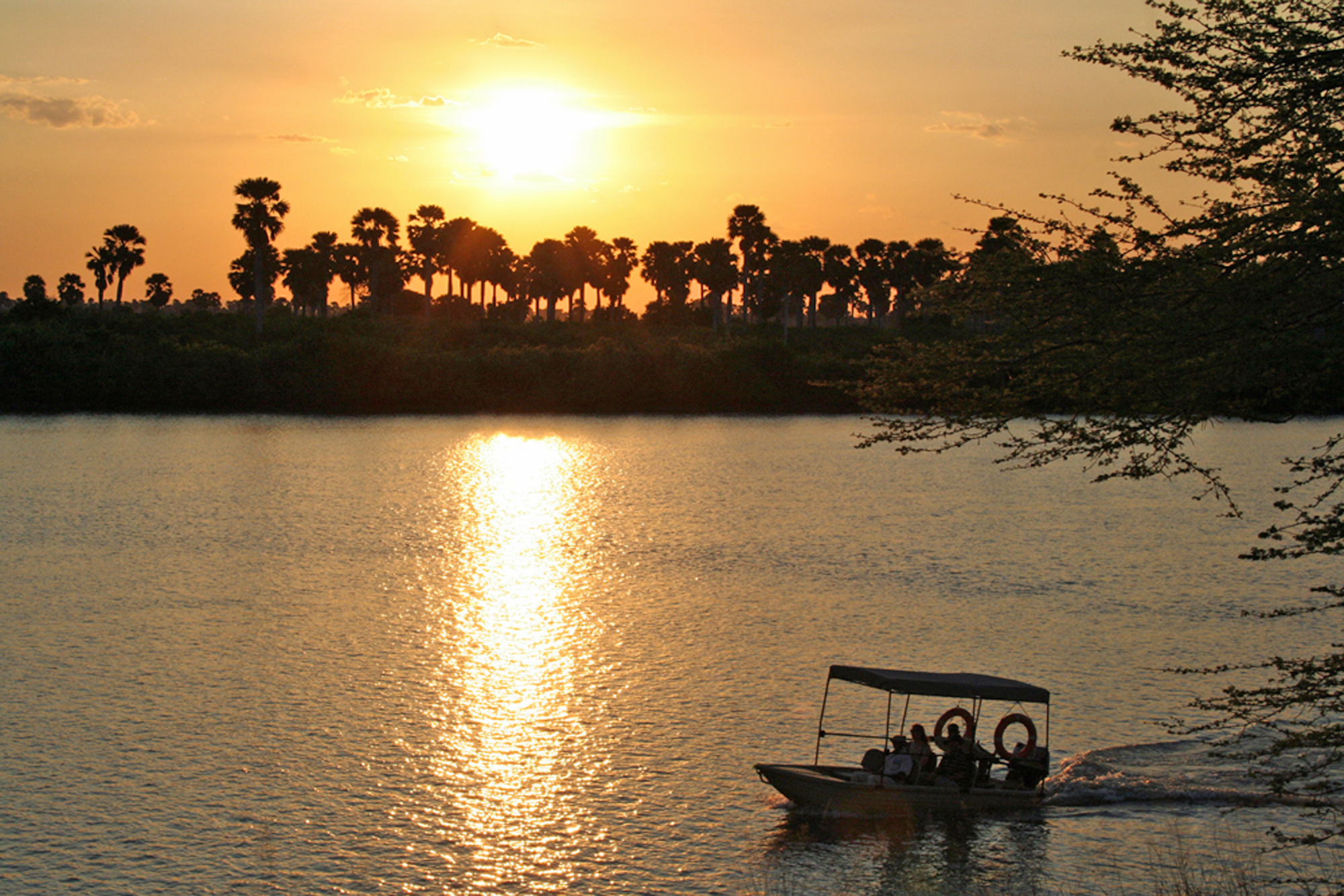 Travelling home to camp on the Rufiji at sunset