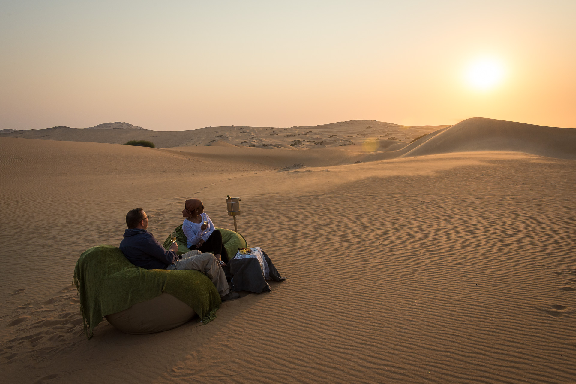 Watch the sun set over the dunes of the world’s oldest desert 