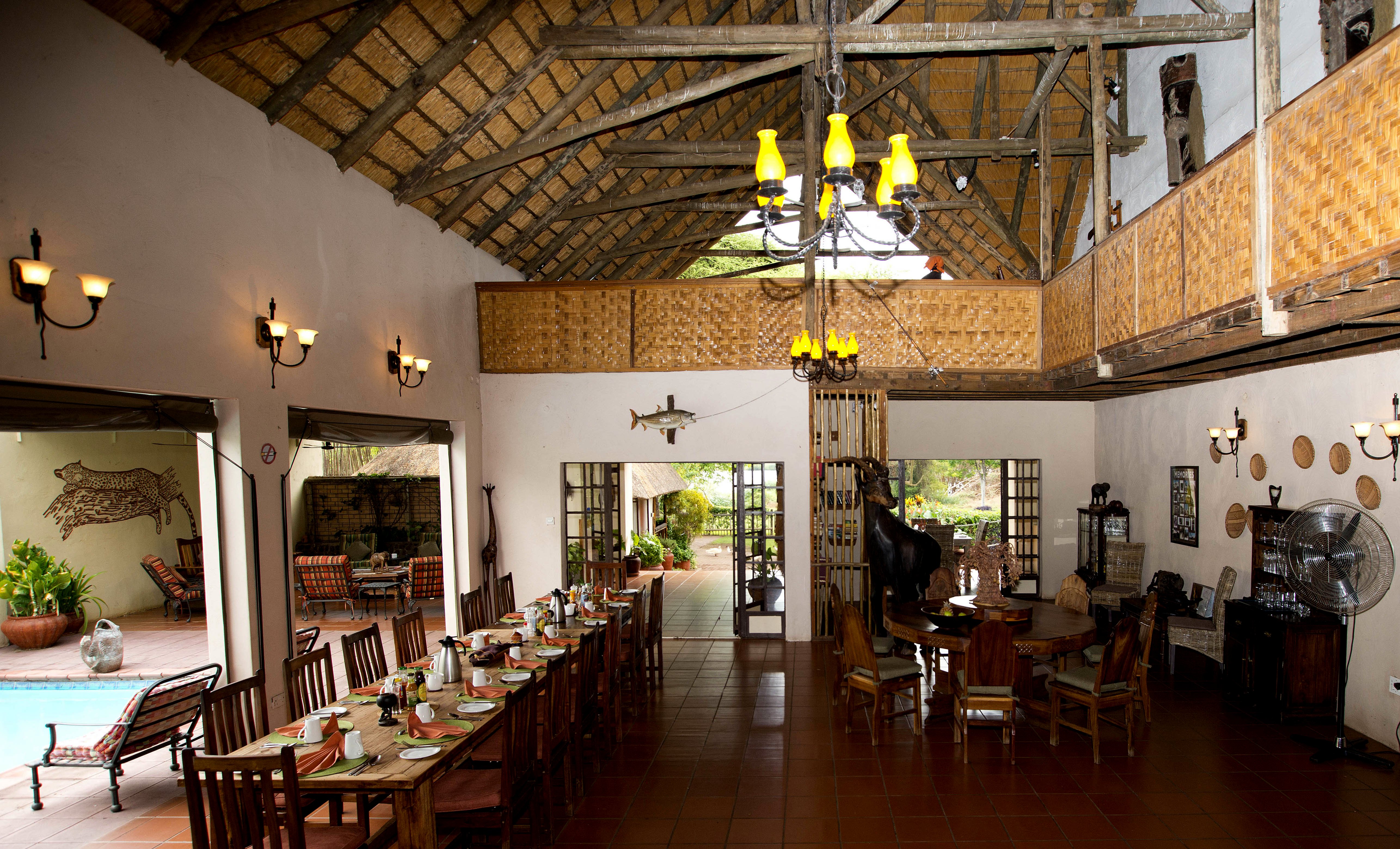 Entertainment area with restaurant, upstairs bar, and pool