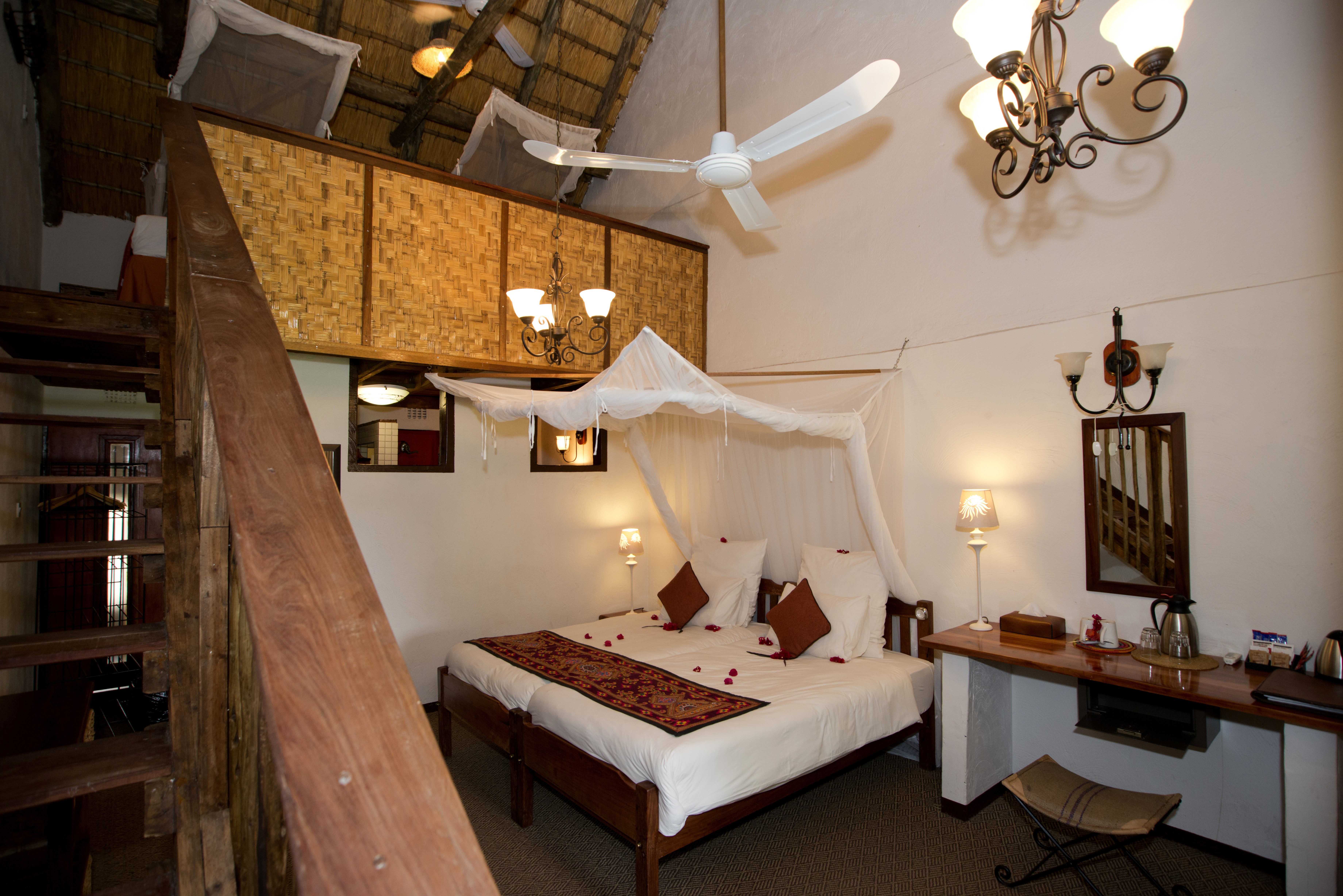 Upstairs family room, view with staircase onto mezzanine deck