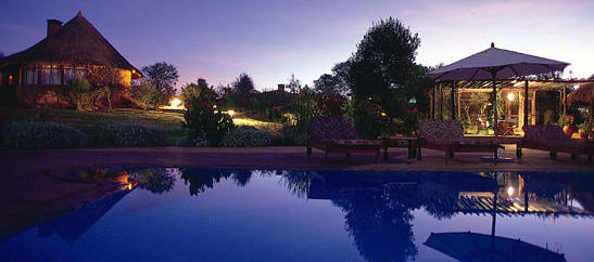 A view of the swimming pool at night.