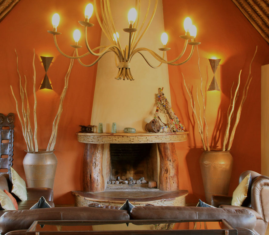 Lounge for drinks or board games by the fireplace