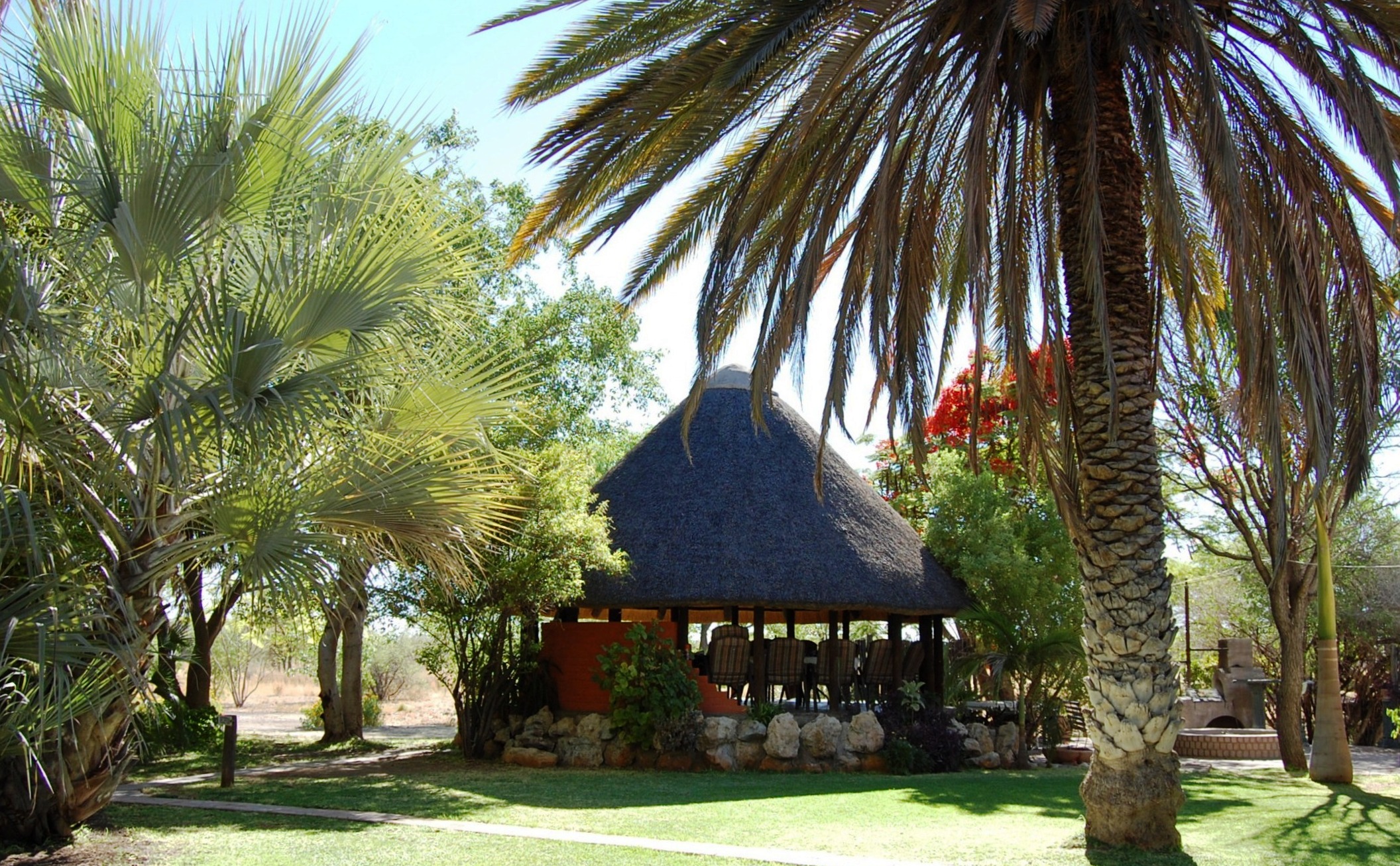 The large garden offers plenty of seating both in shade and in sun