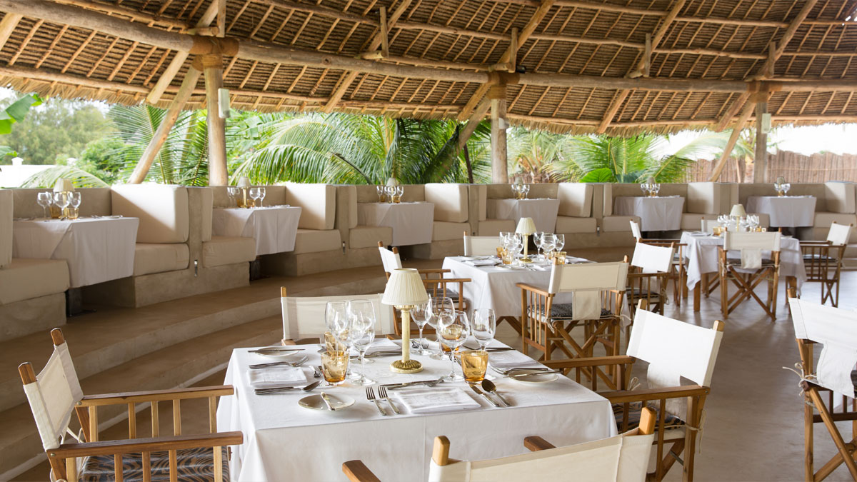 Our Main Restaurant sits over 200 guests and serves under the typical Makuti roof style. It offer a lavish buffet for breakfast. Opening time is from 7.30 am to 10am .Lunch time is from 1pm to 2.30pm.  At dinner time the service is A la carte with vegetables served at the buffet. Opening time is from 8pm to 9.30pm.