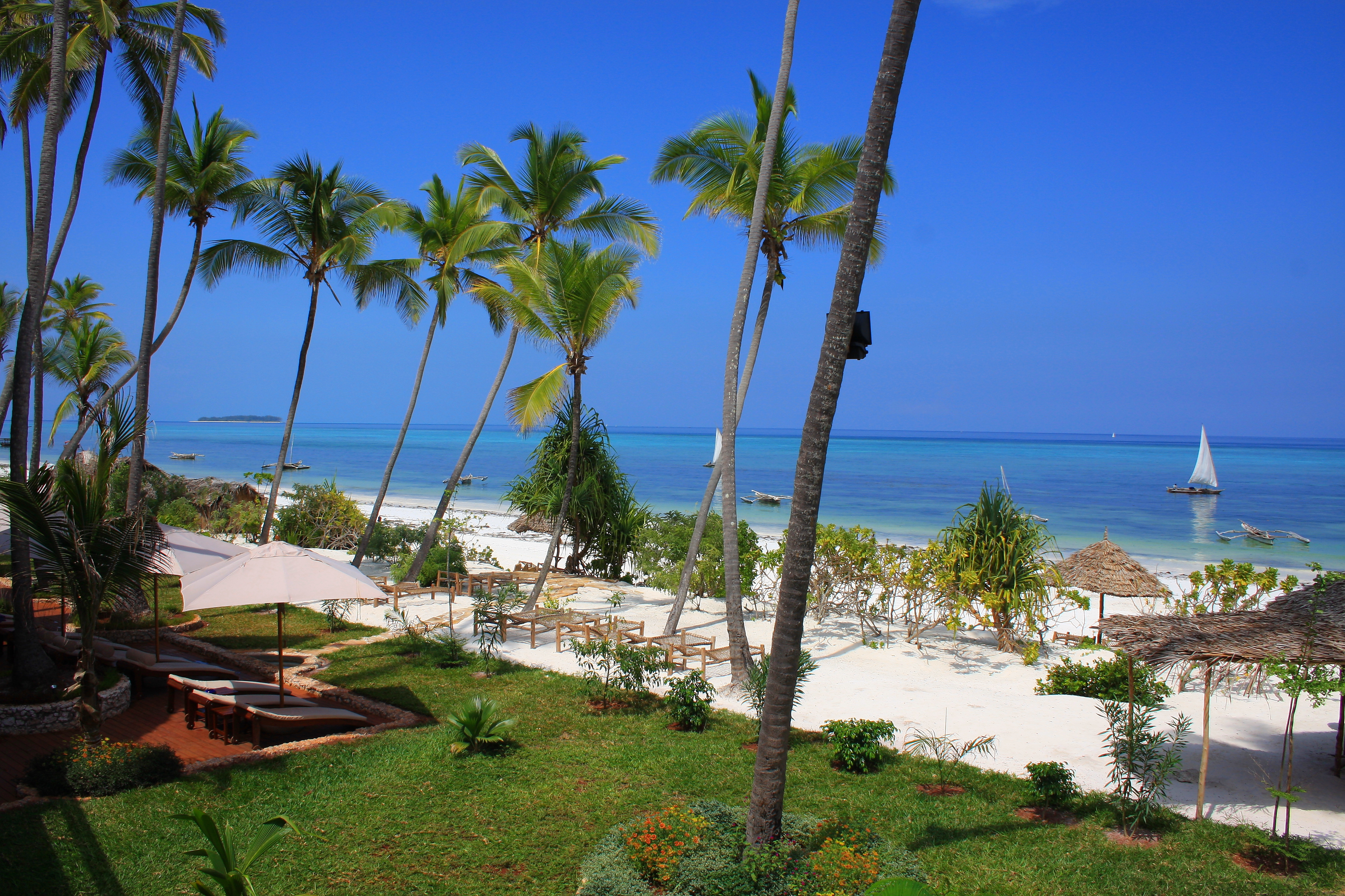 Hotel view of the eastern shoreline of Zanzibar, with the Mnemba marine reserve in the distance.