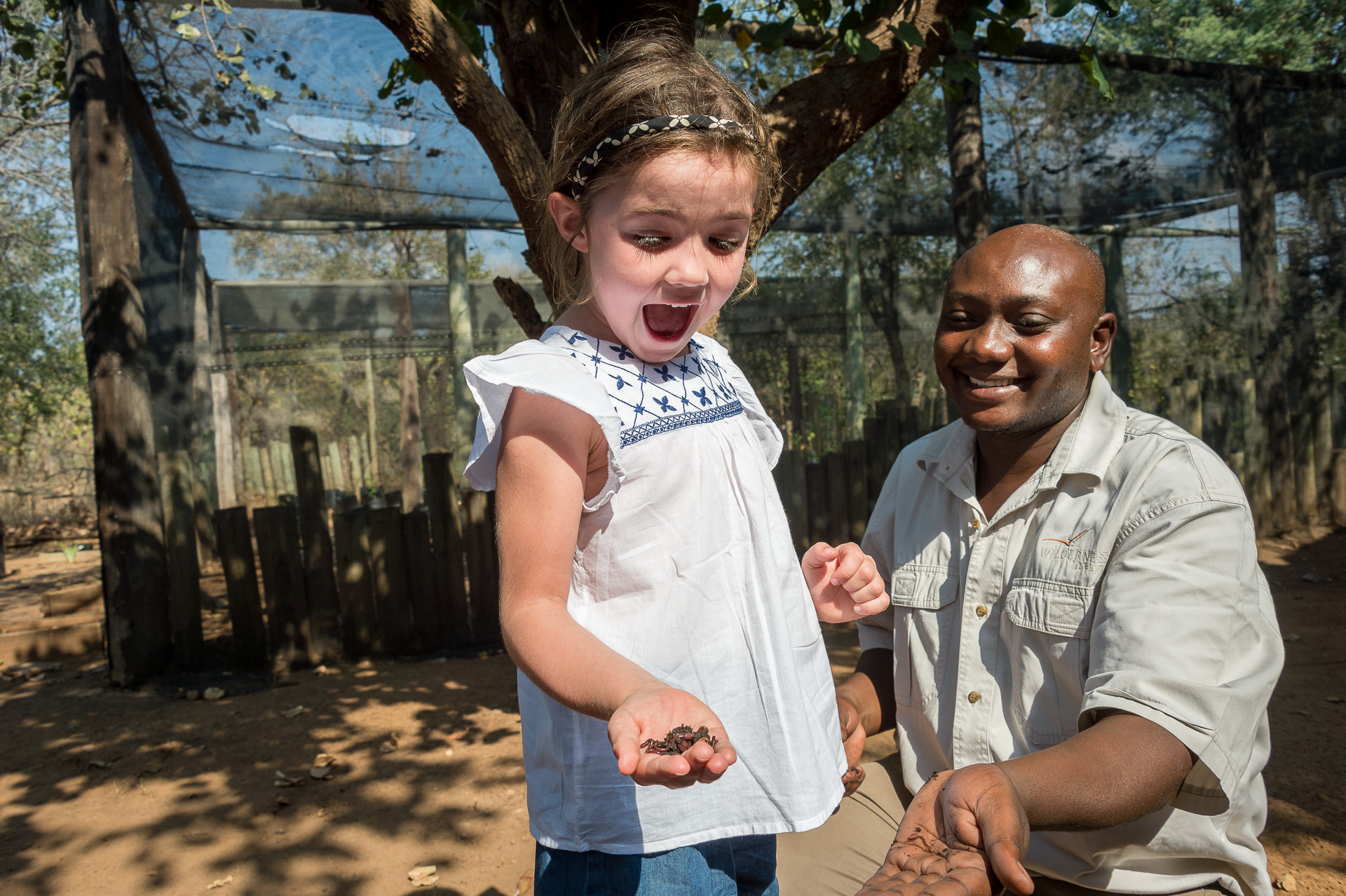 Enjoying the worm farm tour with John