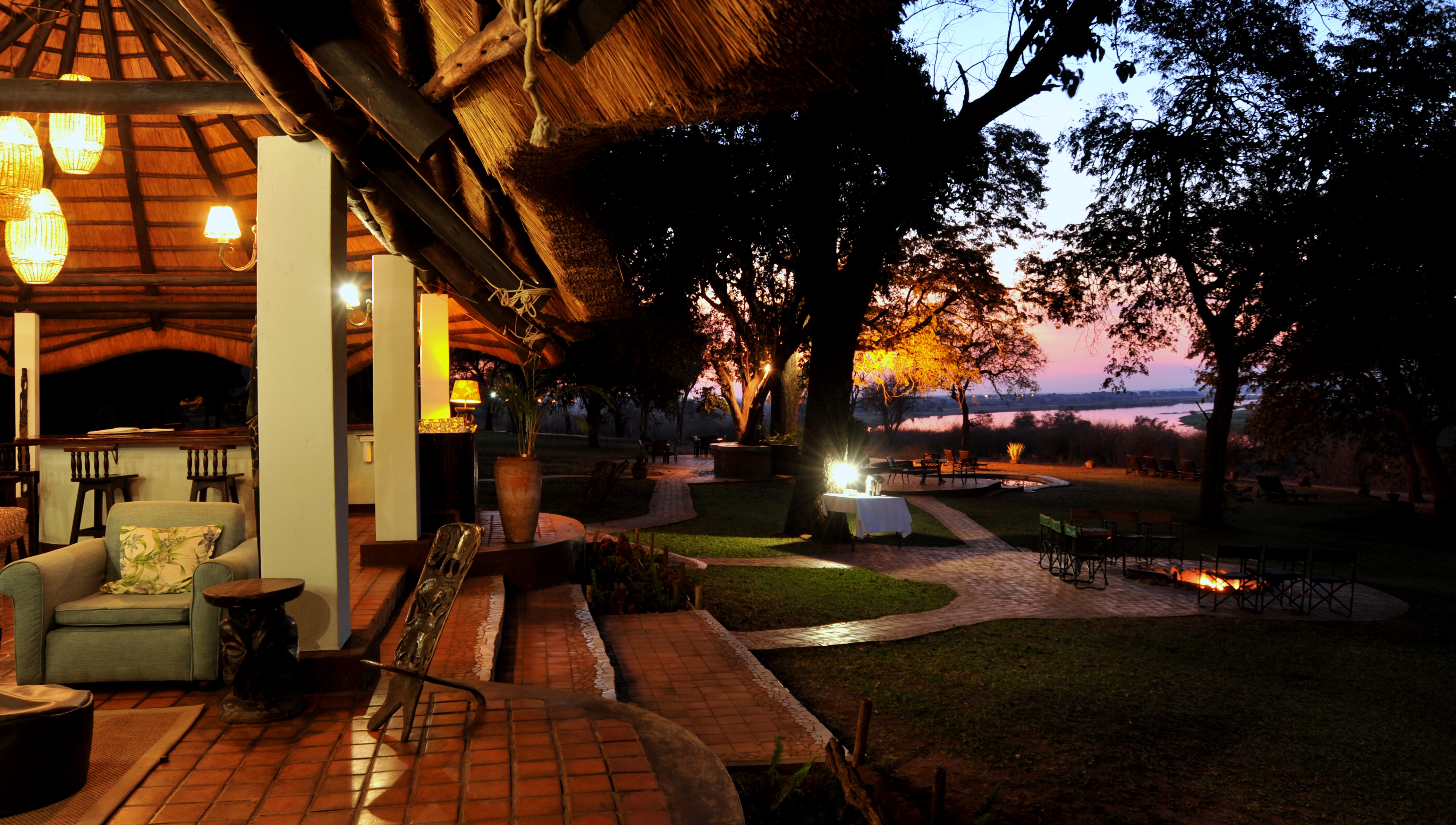 The main Lodge is a charming thatched structure, consisting of a lounge, dining room and bar area. This offers fantastic views of both the river and a nearby waterhole, which attracts game throughout the year