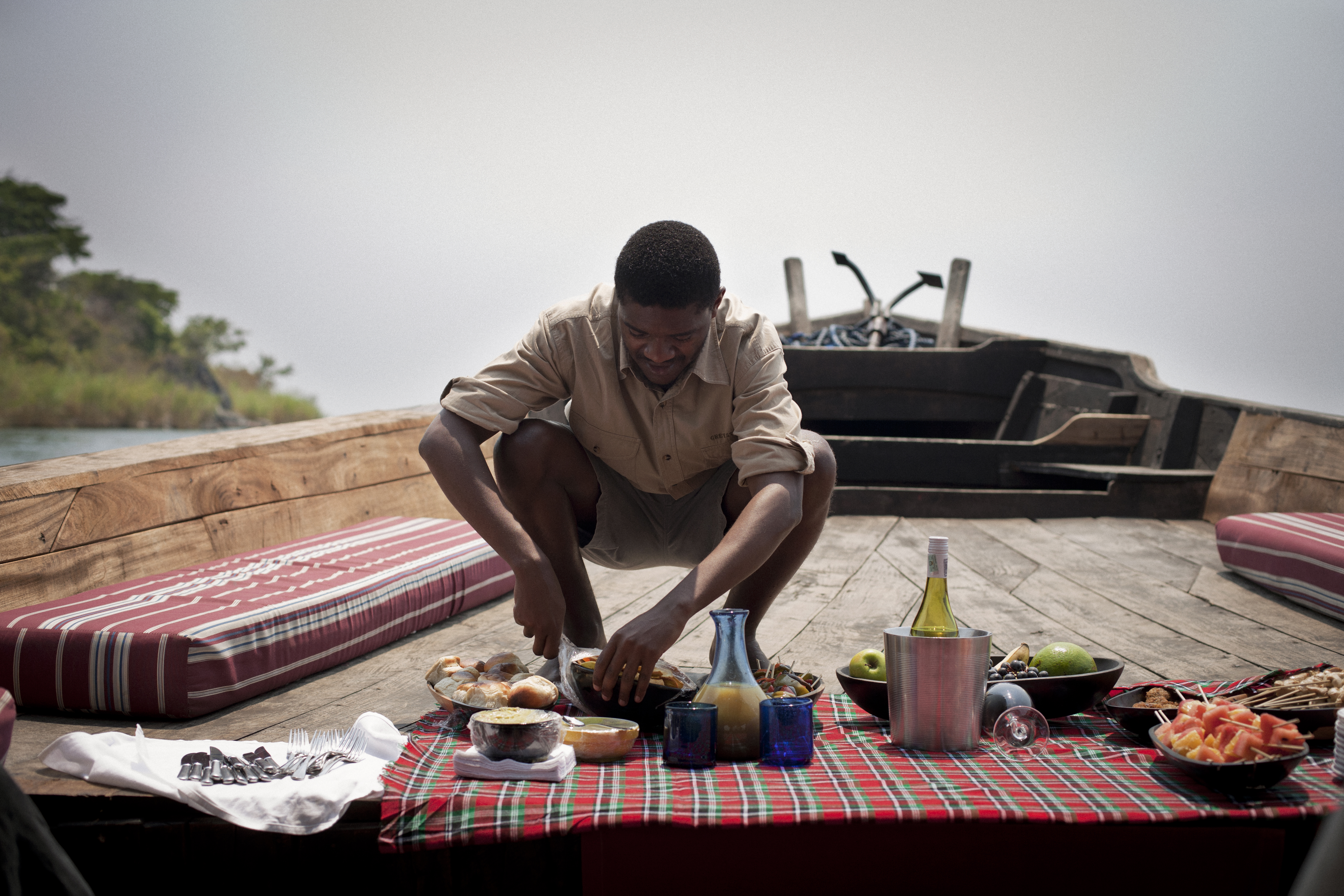 The journey is always part of the destination. After landing at the Mahale airstrip, you board the dhow for a gentle 90min cruise down the lakeshore, with a picnic spread and a glass of chilled wine in hand.