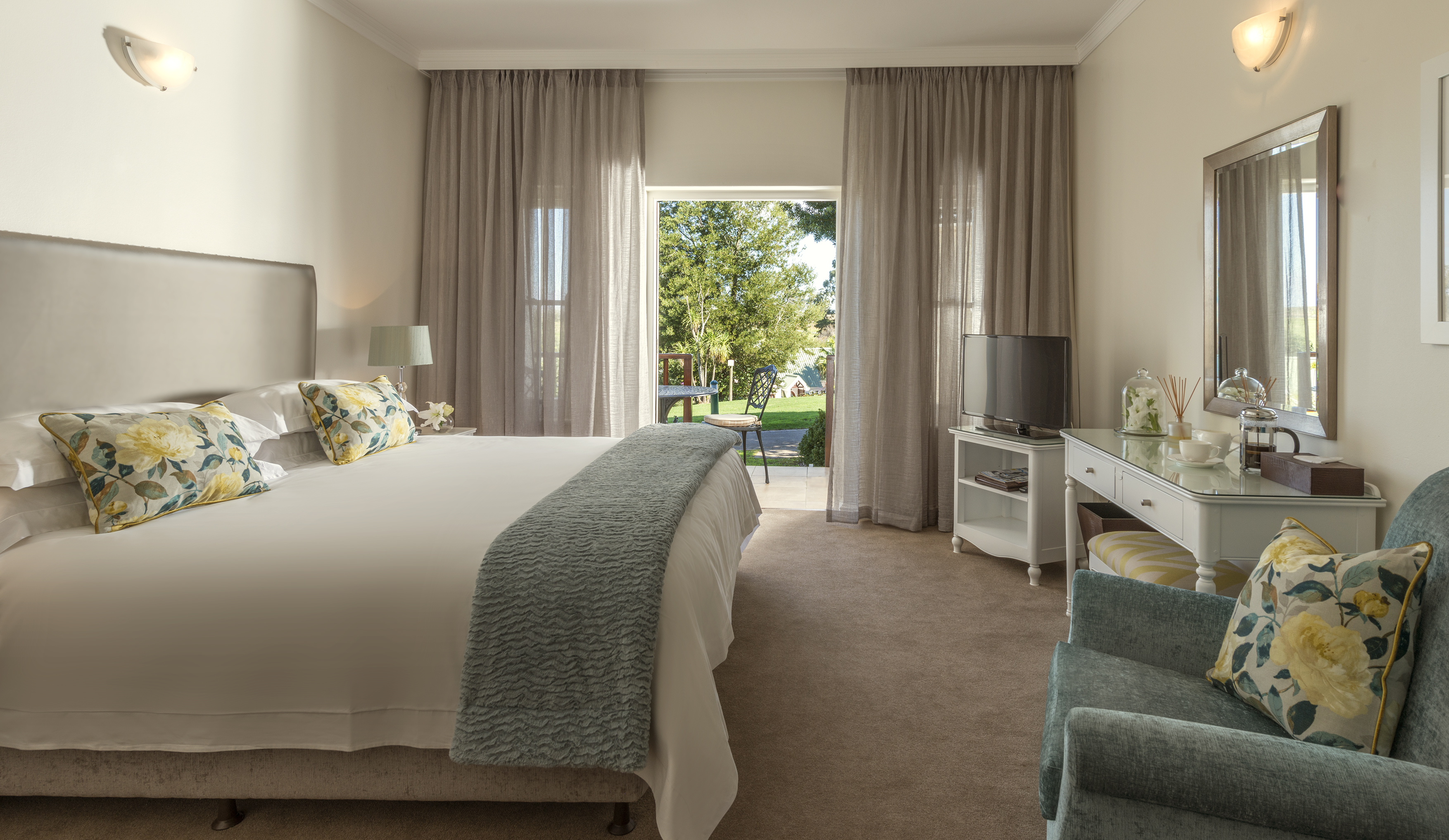 Overlooking the golf course or gardens in 300 Avenues Series.They have a separate lounge area and TVs in the bedroom and lounge