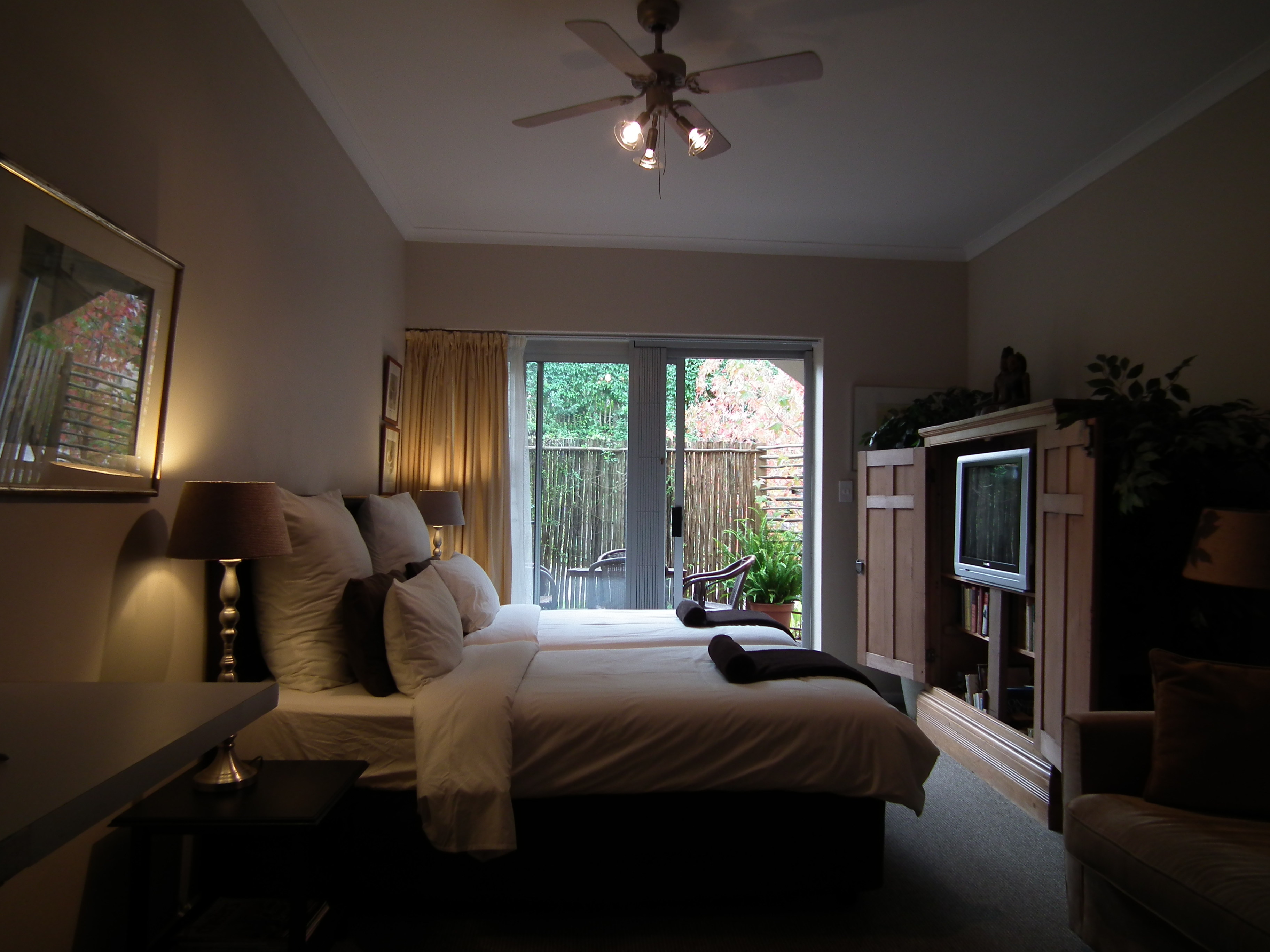 King or Twin bed with double sleeper couch, private outside deck area with weber braai, en-suite bathroom (shower only), easy access to solar heated pool, safe parking