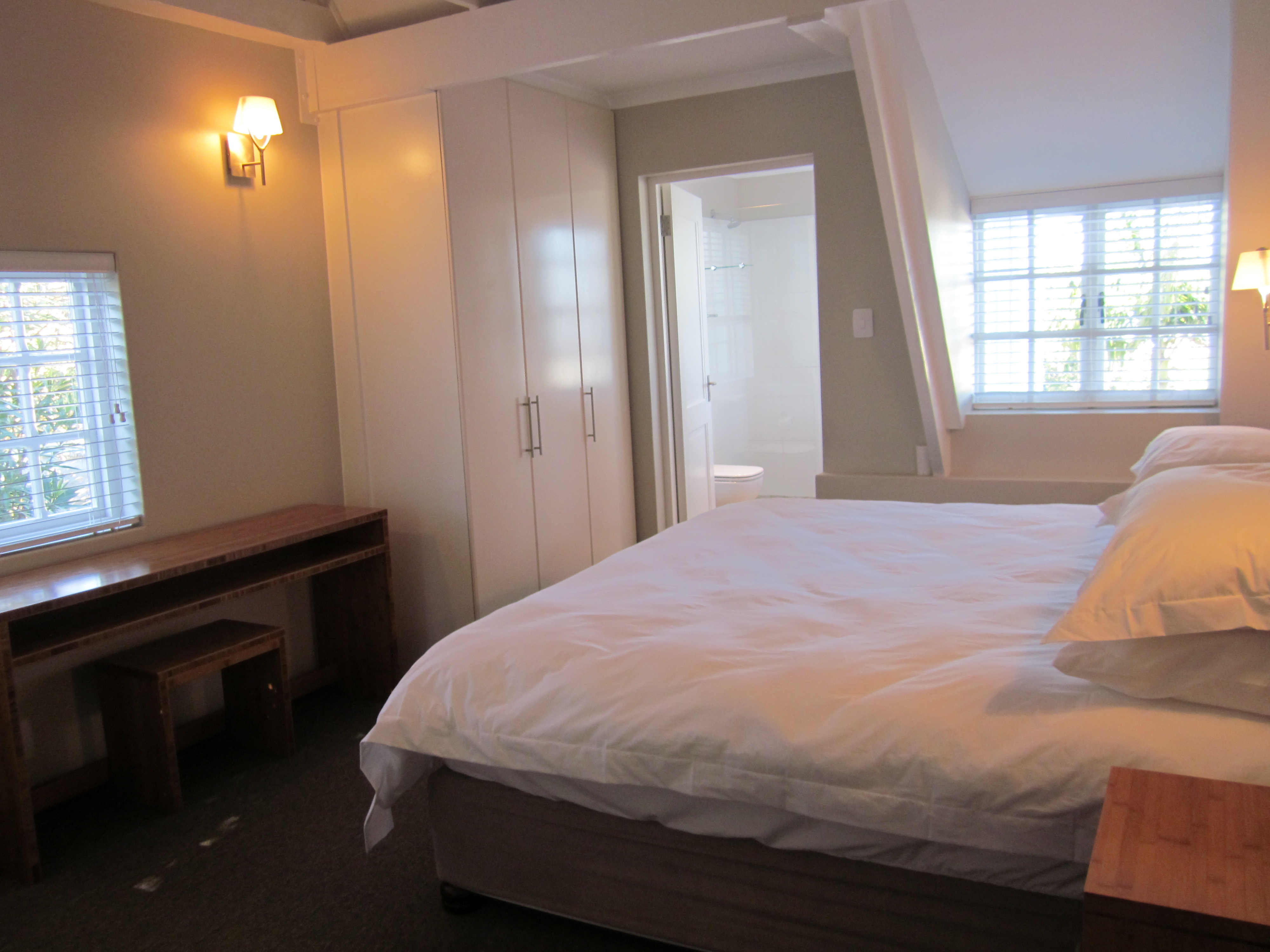 The main bedroom has a bathroom en-suite, and an additional single bed