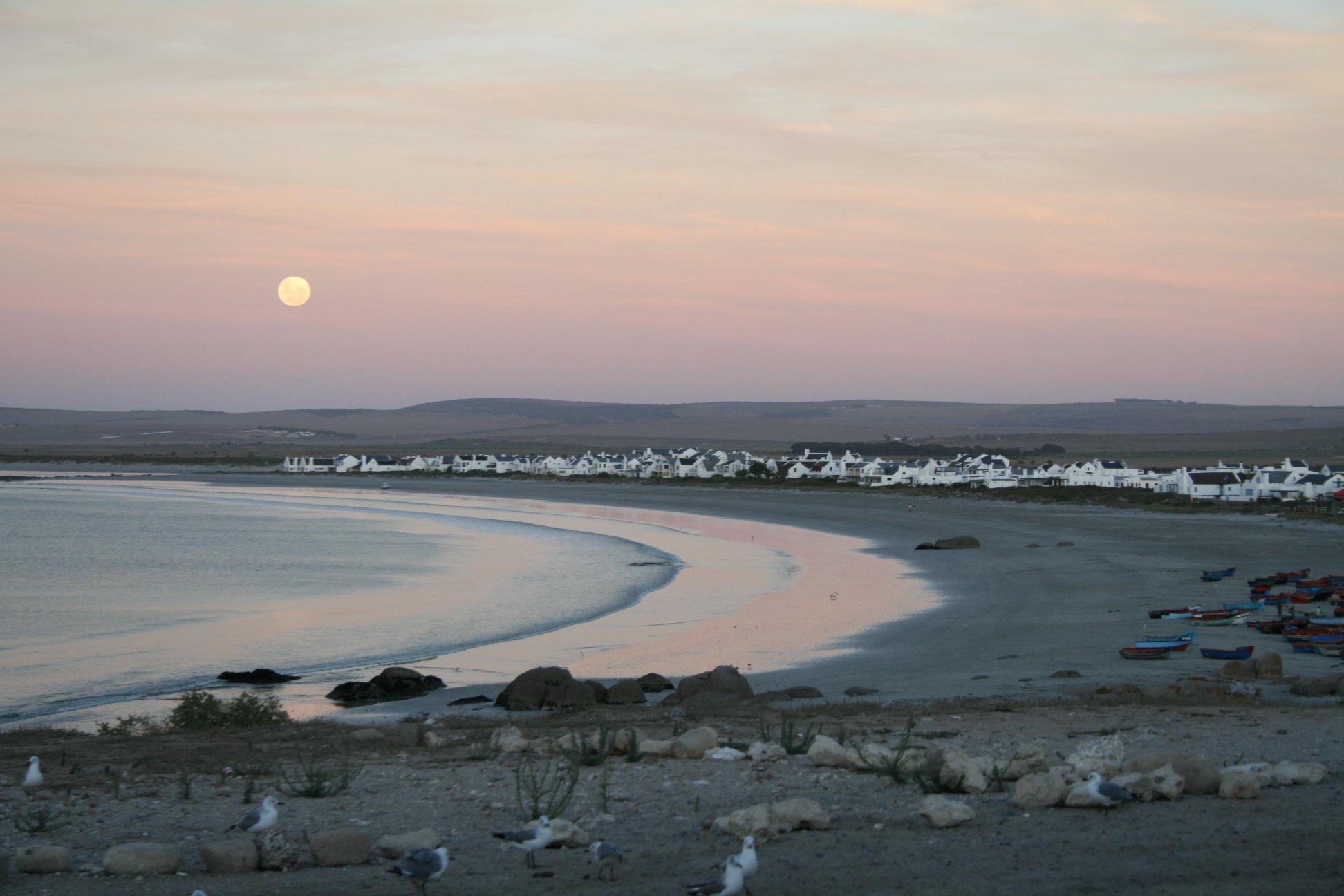 Moon rising over the bay