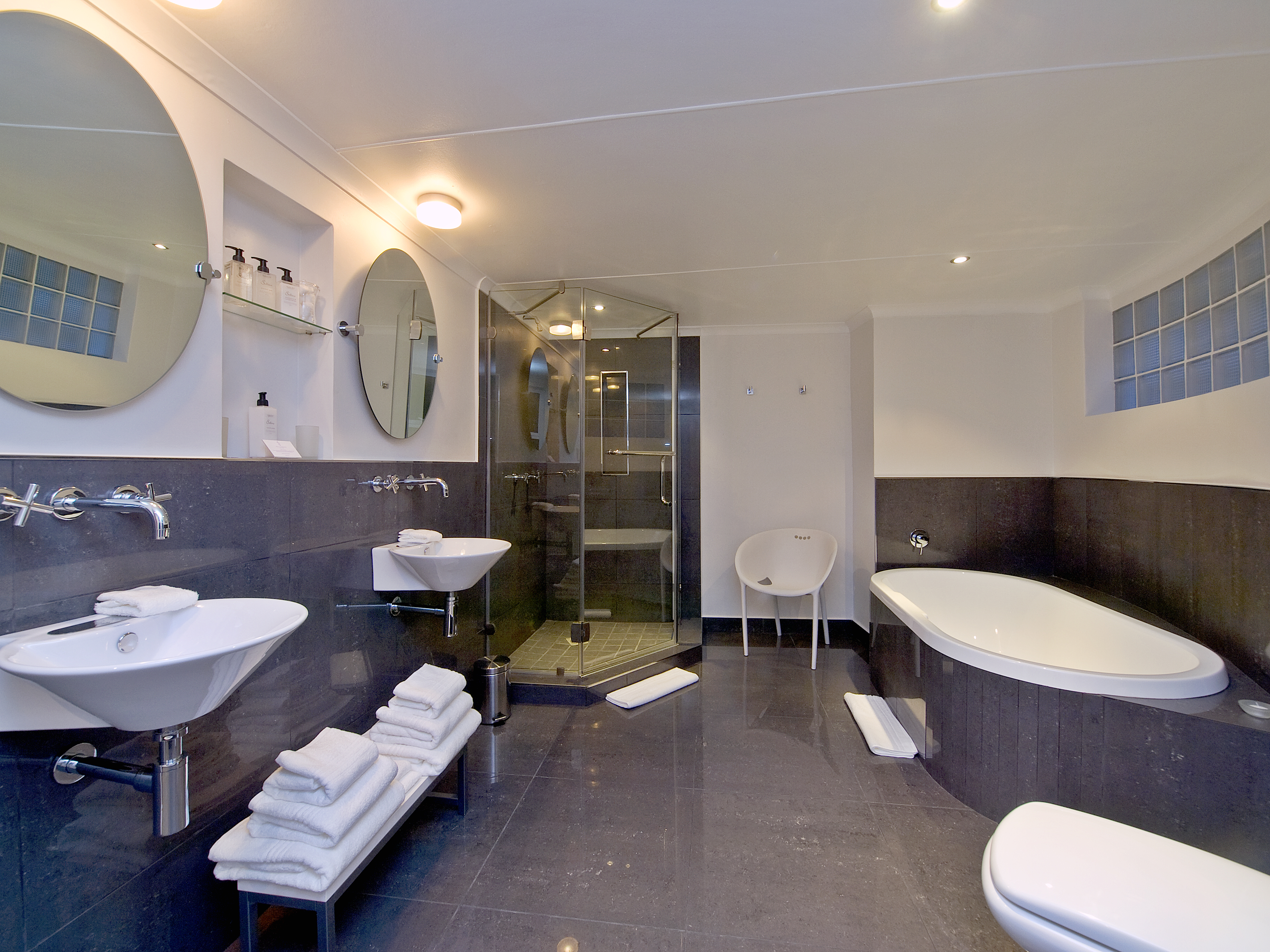 Each also features a comfortably furnished and also very spacious luxury bathroom in cutting design with under-floor heating and double washbasin.