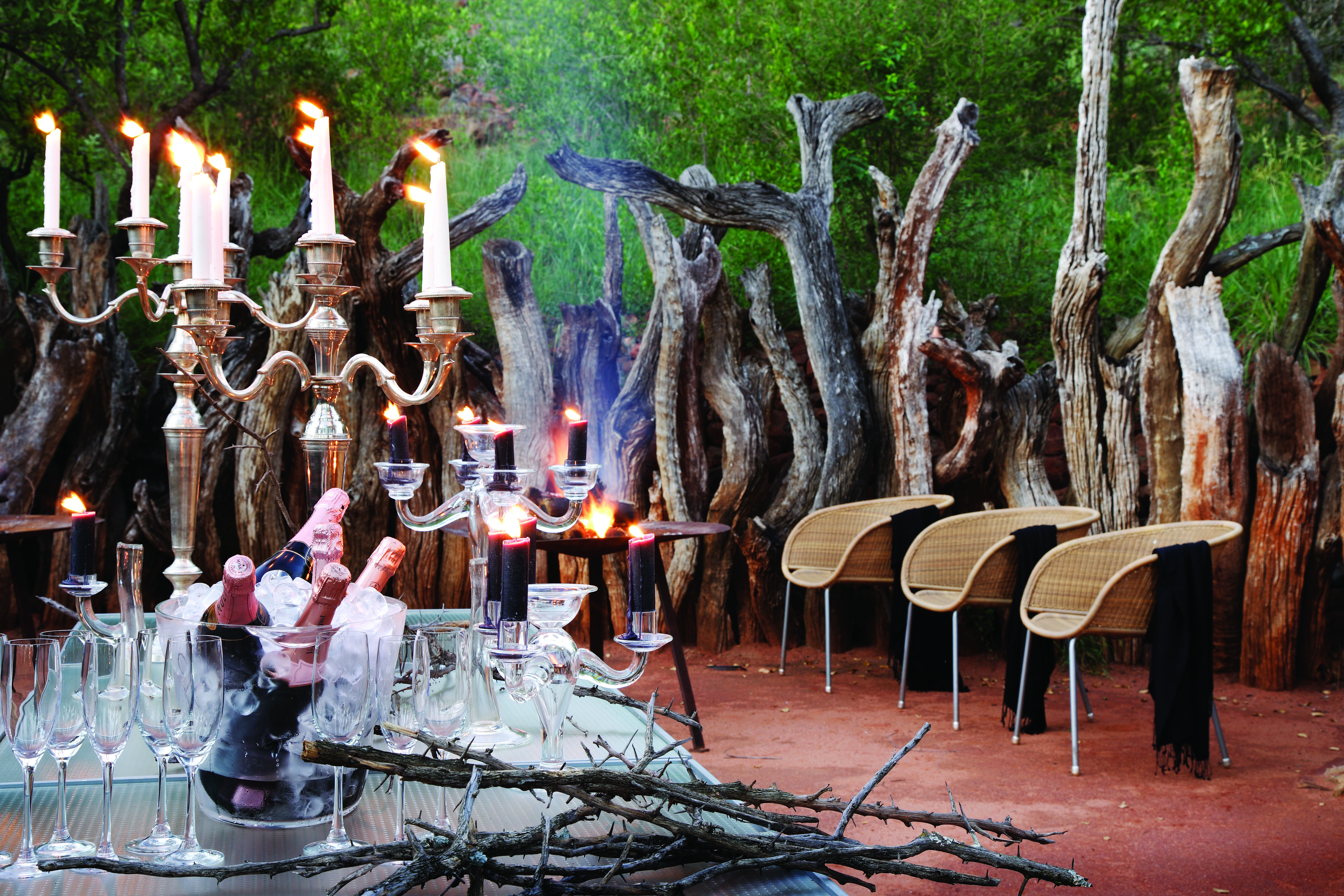 Outdoor dining in our Boma allows our guests to experience a true South African Braai.