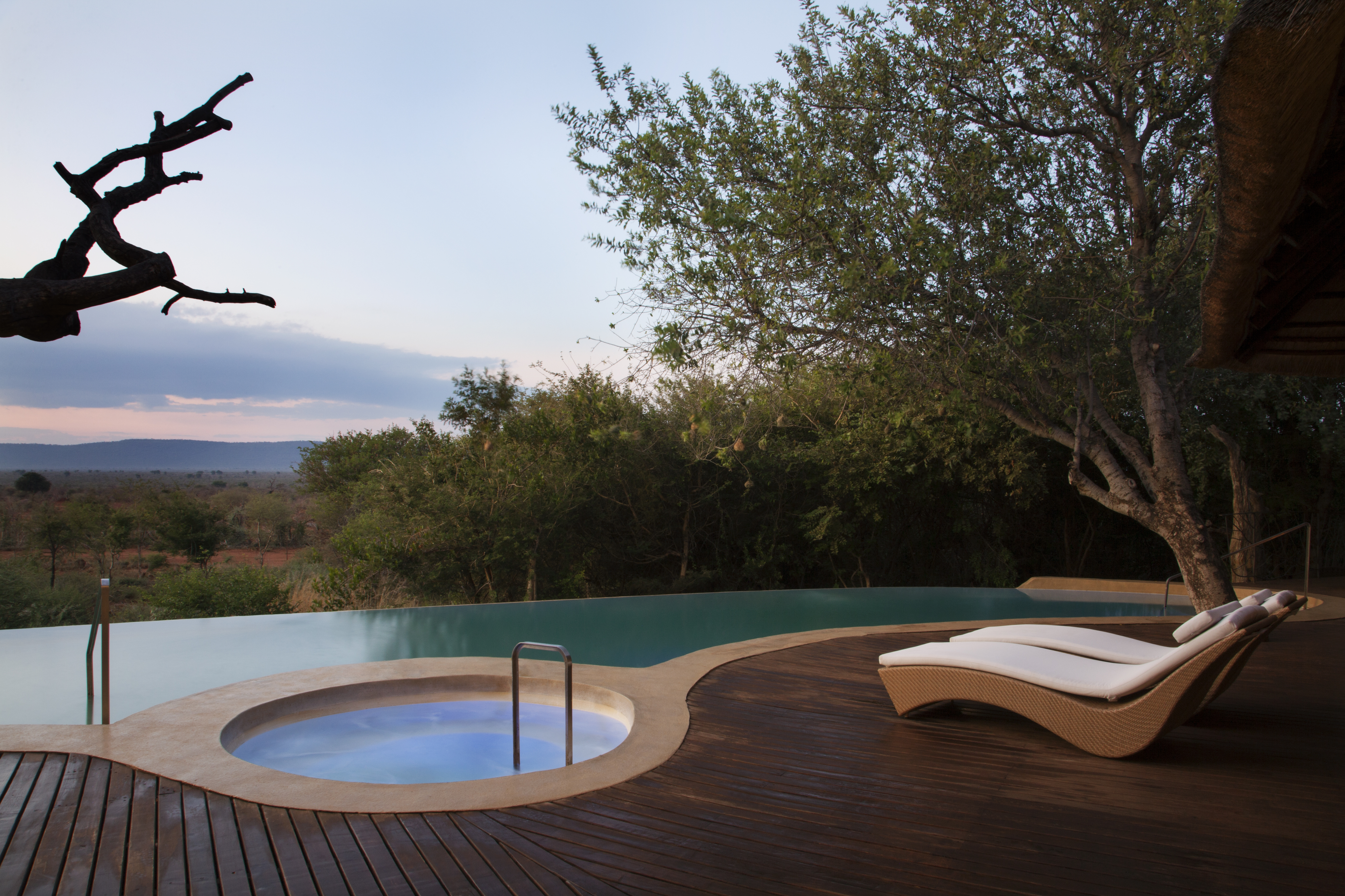 Pool with a view and a hot outdoor jacuzzi tub