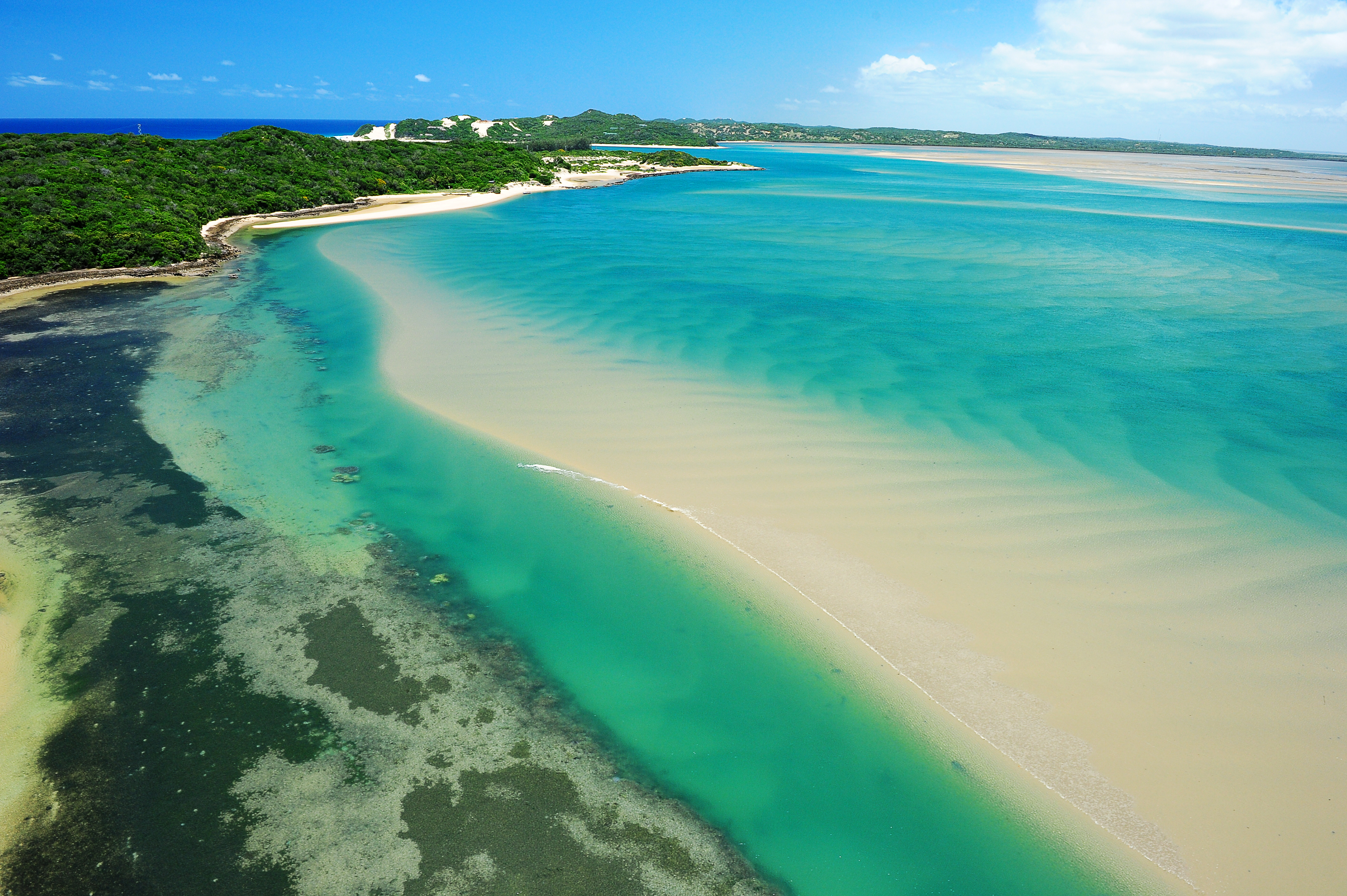 The lodge is in the background, the foreground shows the easy to access pristine snorkeling reefs