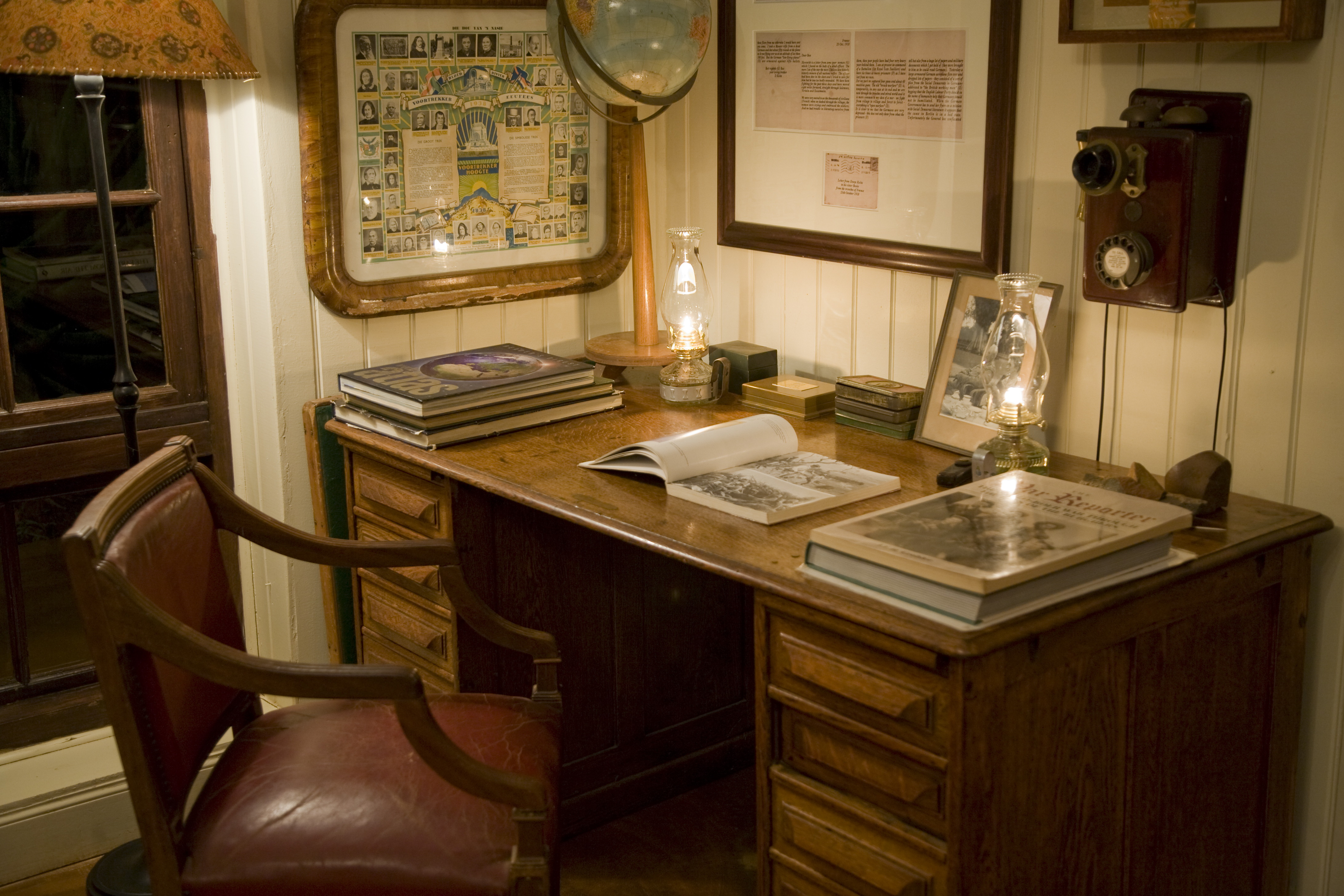 Antique library desk in the lounge dotted with memorabilia