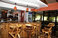Enjoy cold beverages at our rustic bar