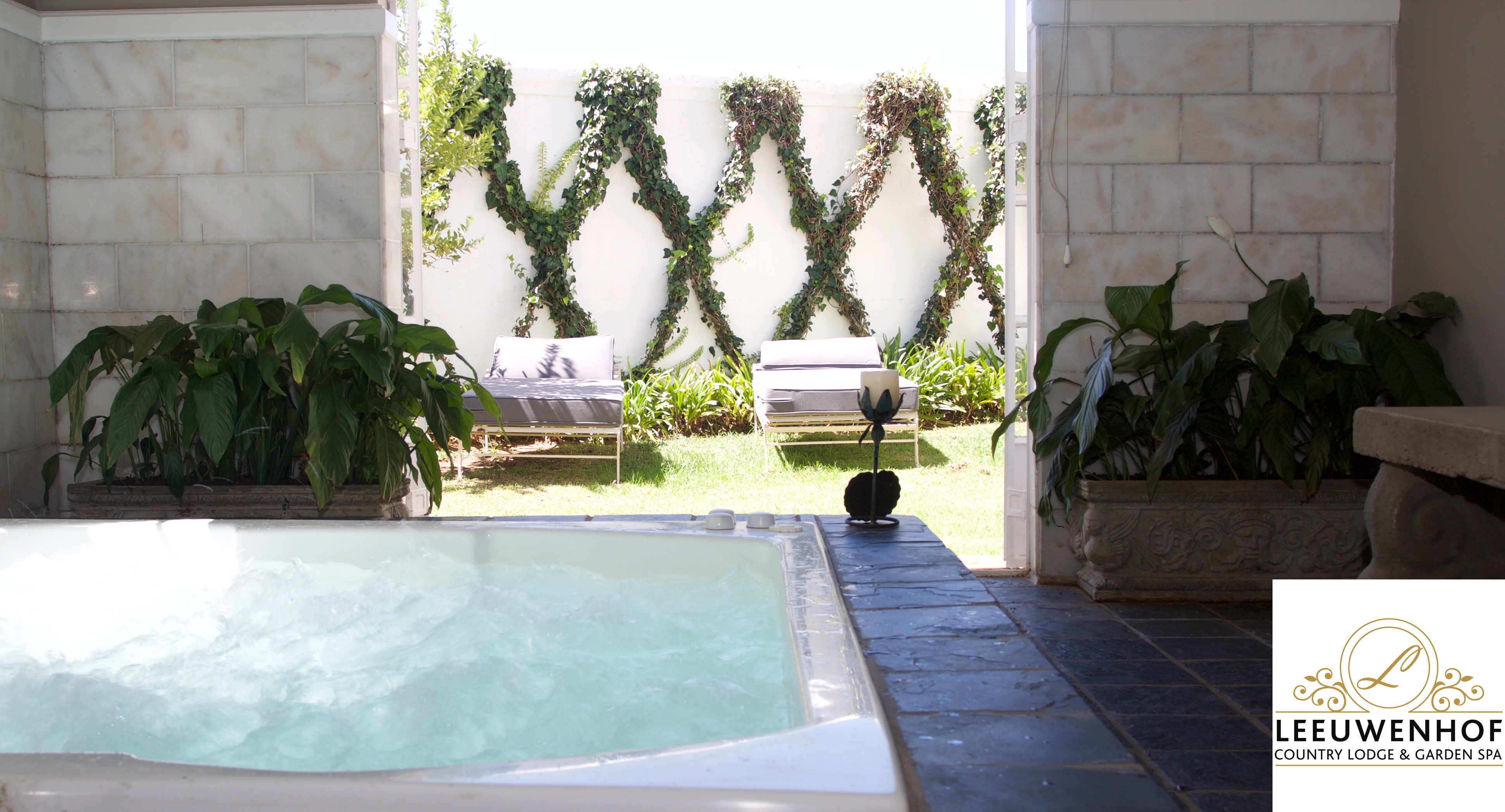 The Tau Suite has its own private garden with a jacuzzi overlooking the garden. Peace personified
