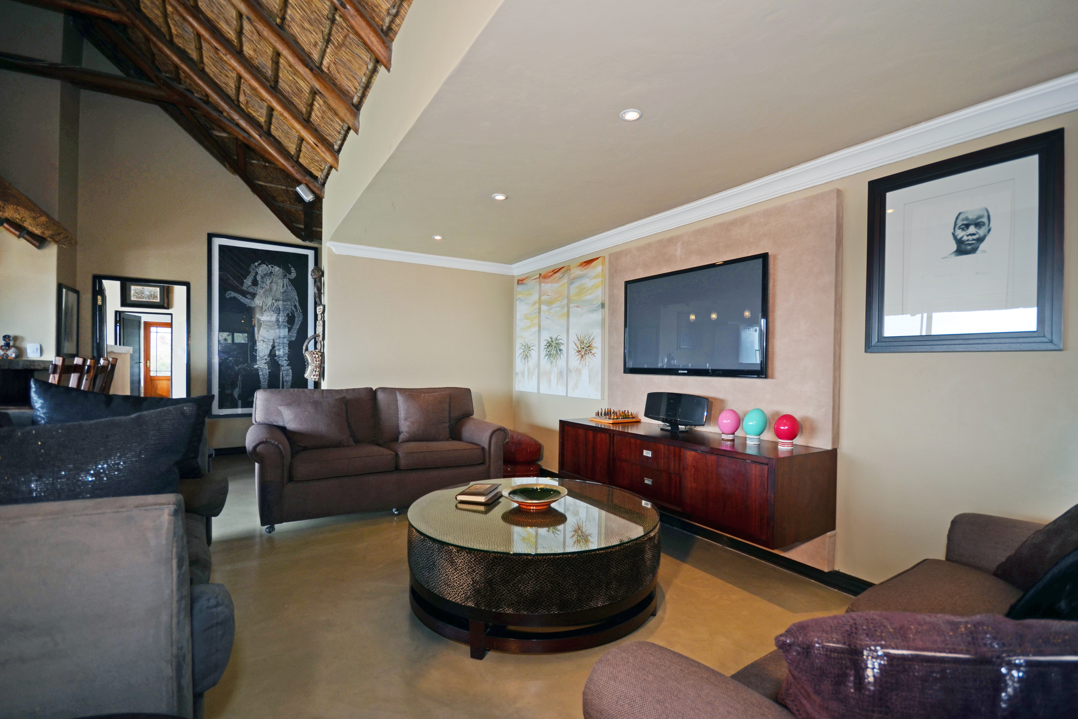 Lounge with TV and bar area