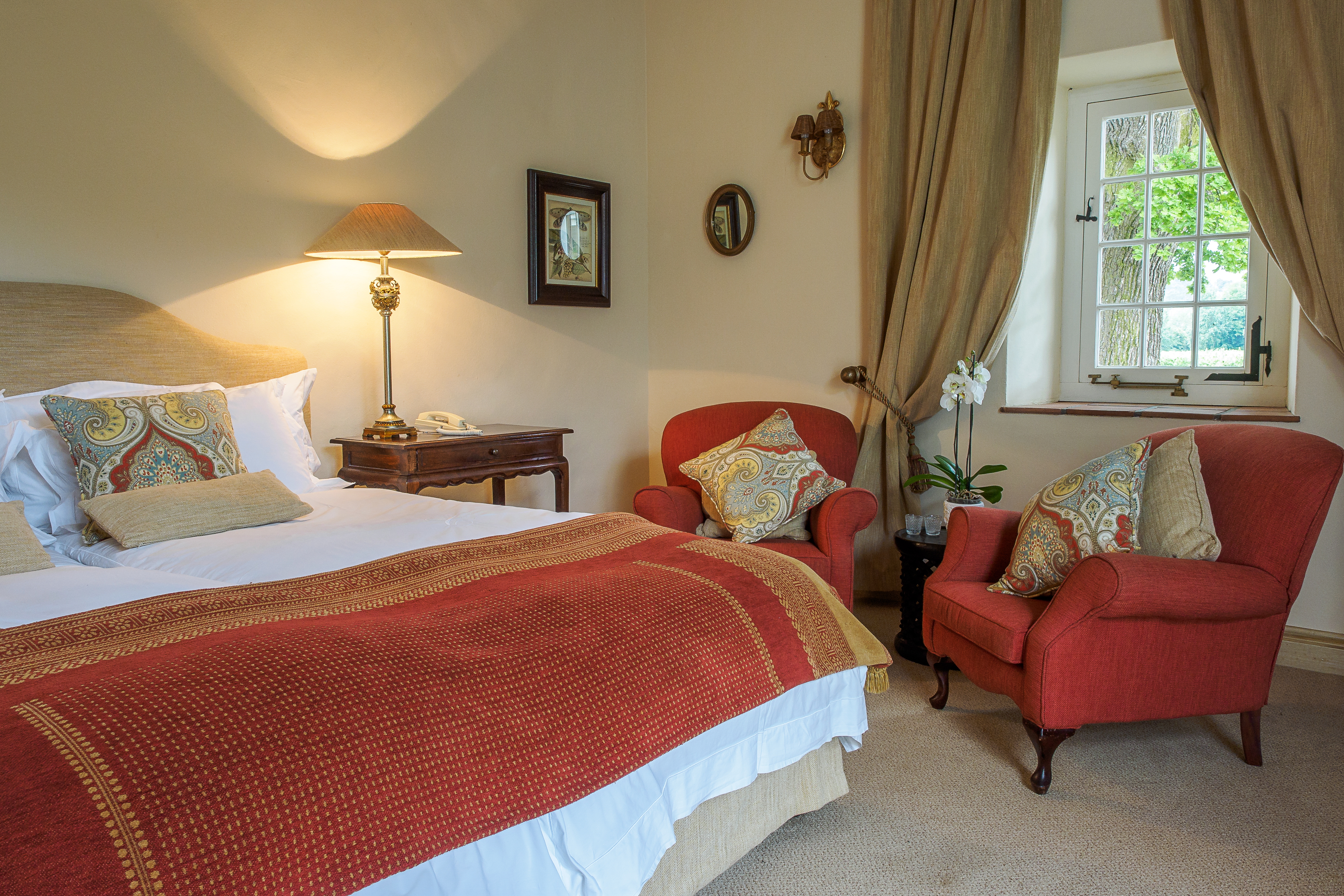 This lovely room is one of two standard twins.  It can also be made into a standard double.  This spacious room has a beautiful painted ceiling and en suite bathroom with separate bath & shower, plus his & hers basins.