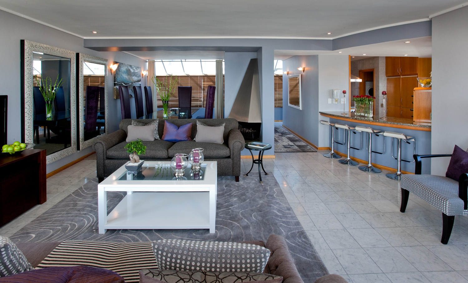 Open plan lounge with full kitchen