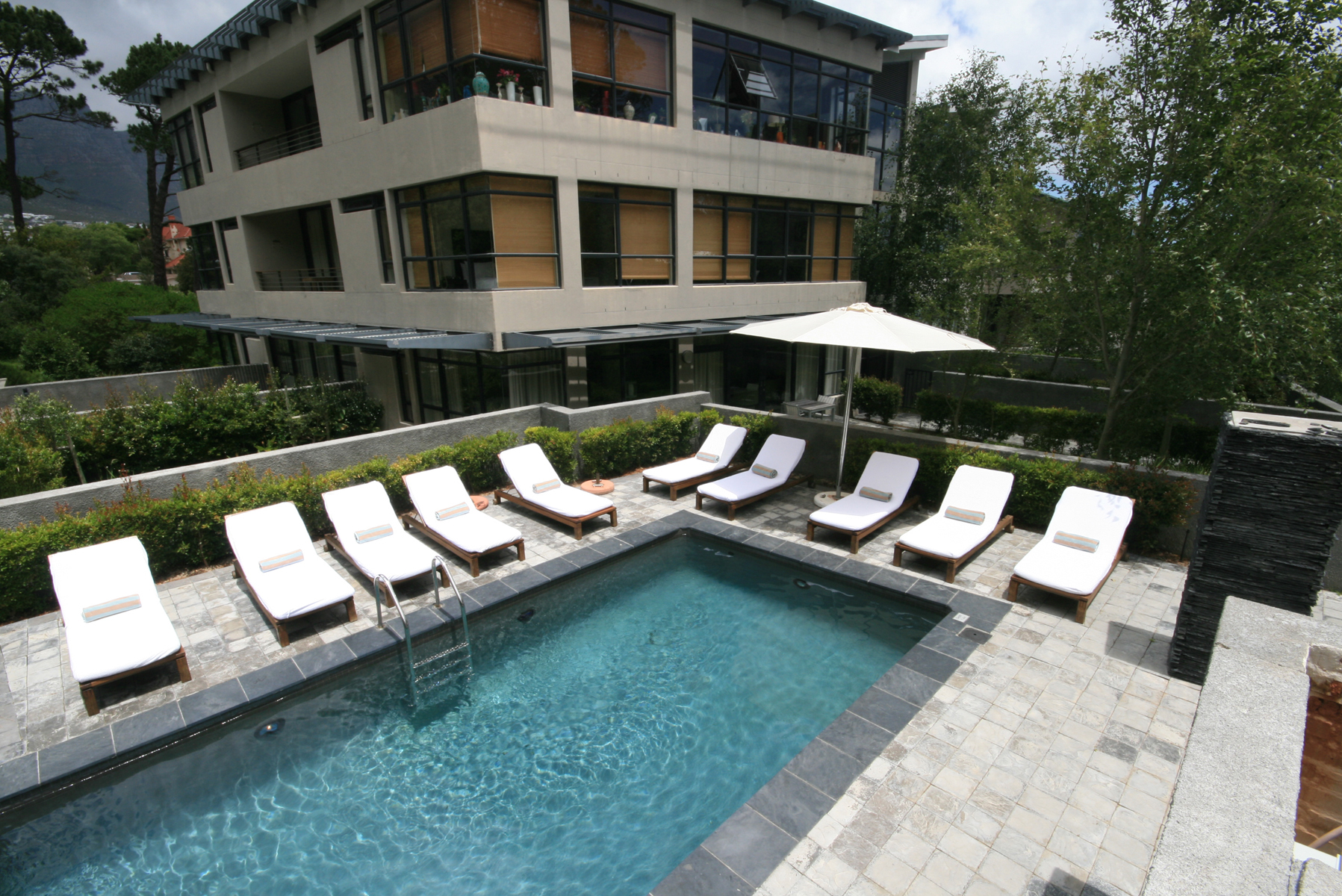 Close up view of pool area with property backround