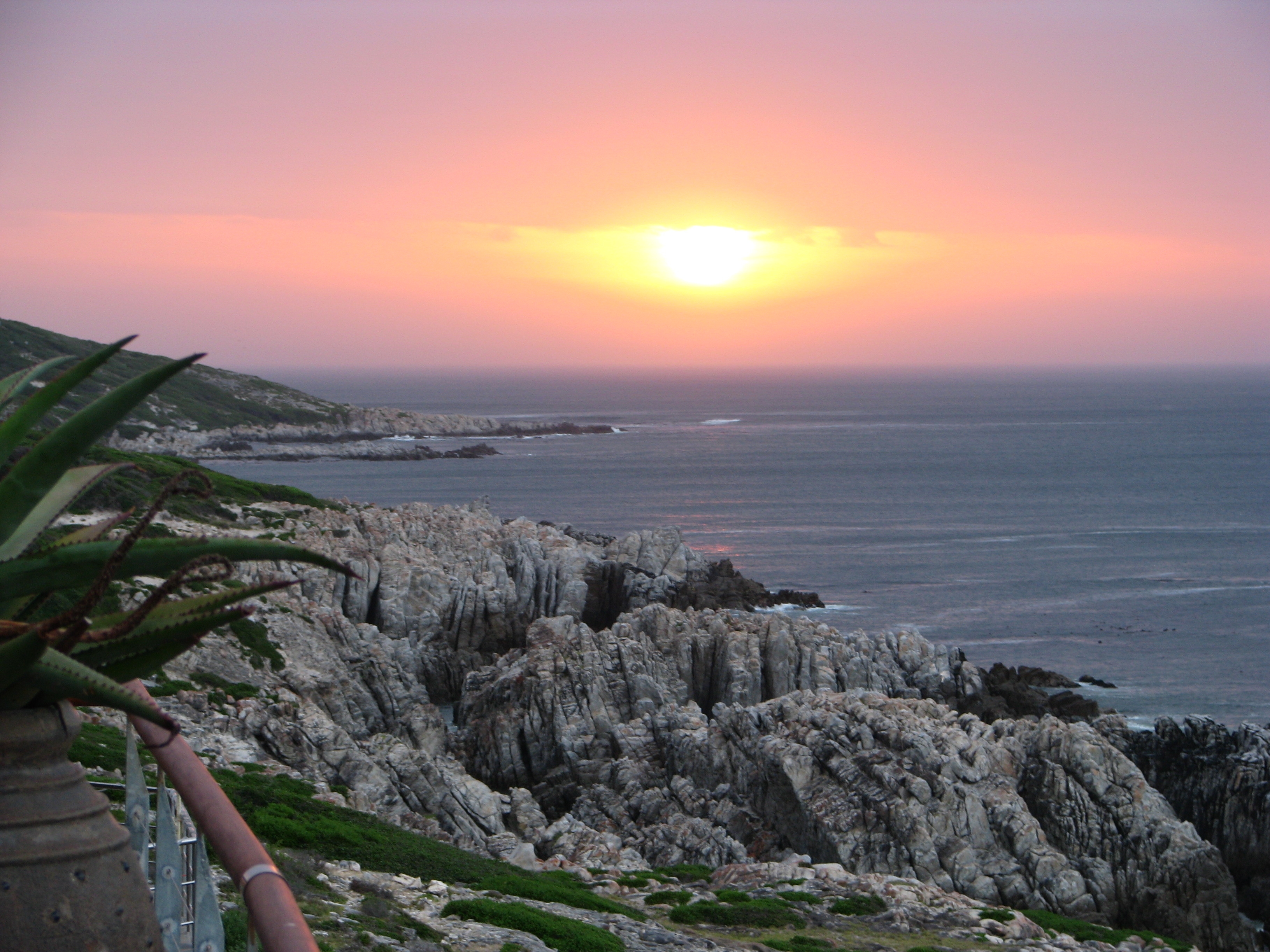 Sunset over Walker Bay from the deck of Cliff Lodge