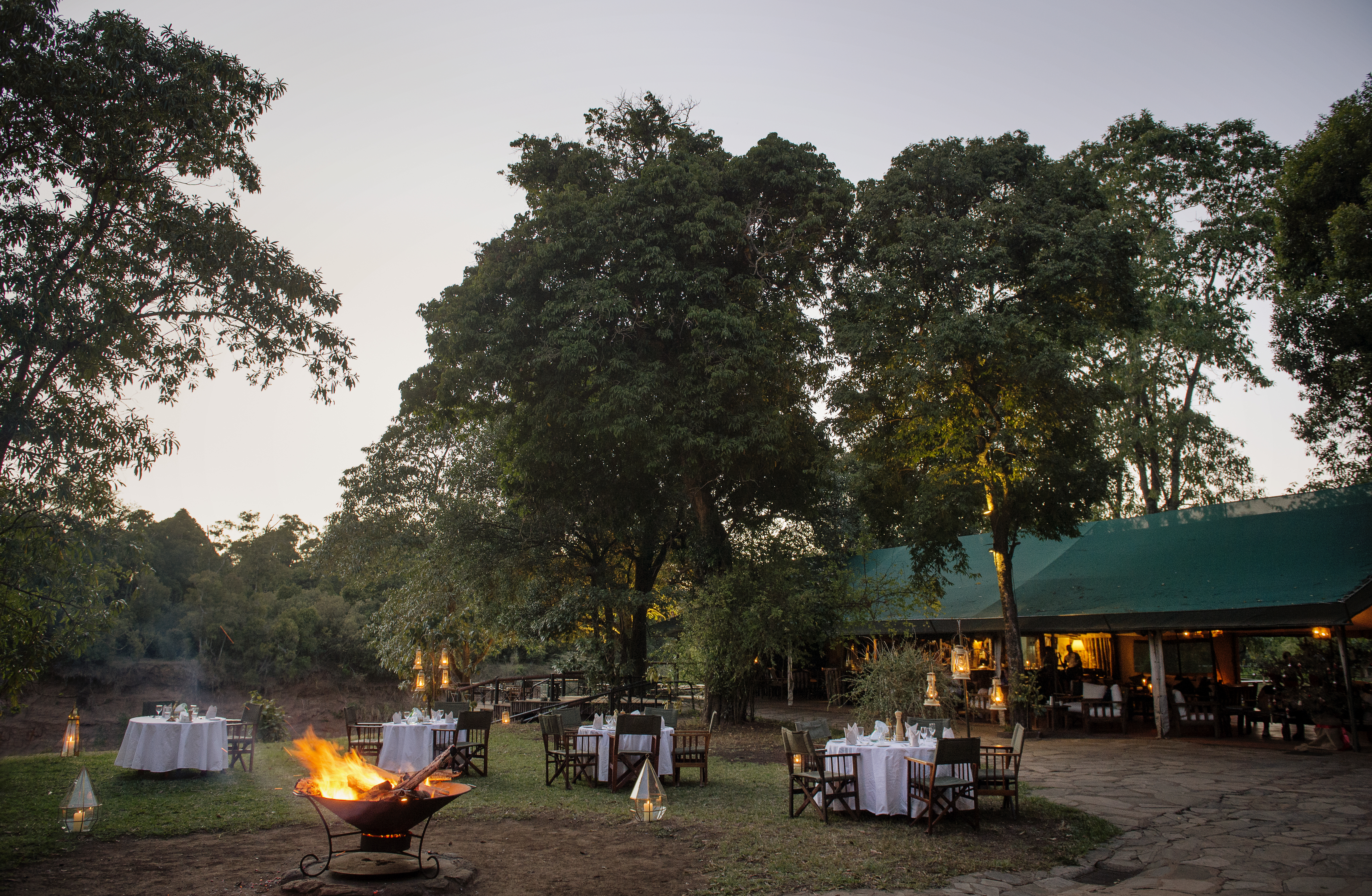 Dinner round camp fire 