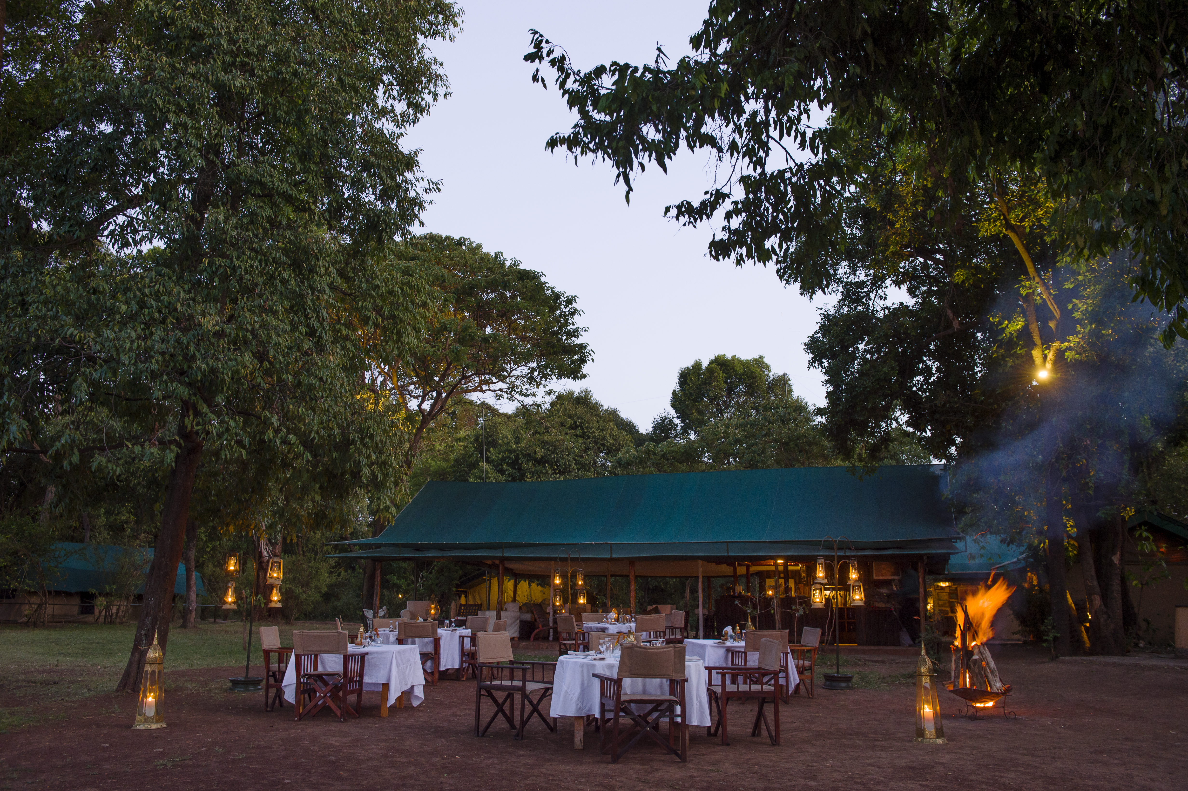 Dining round the camp fire 