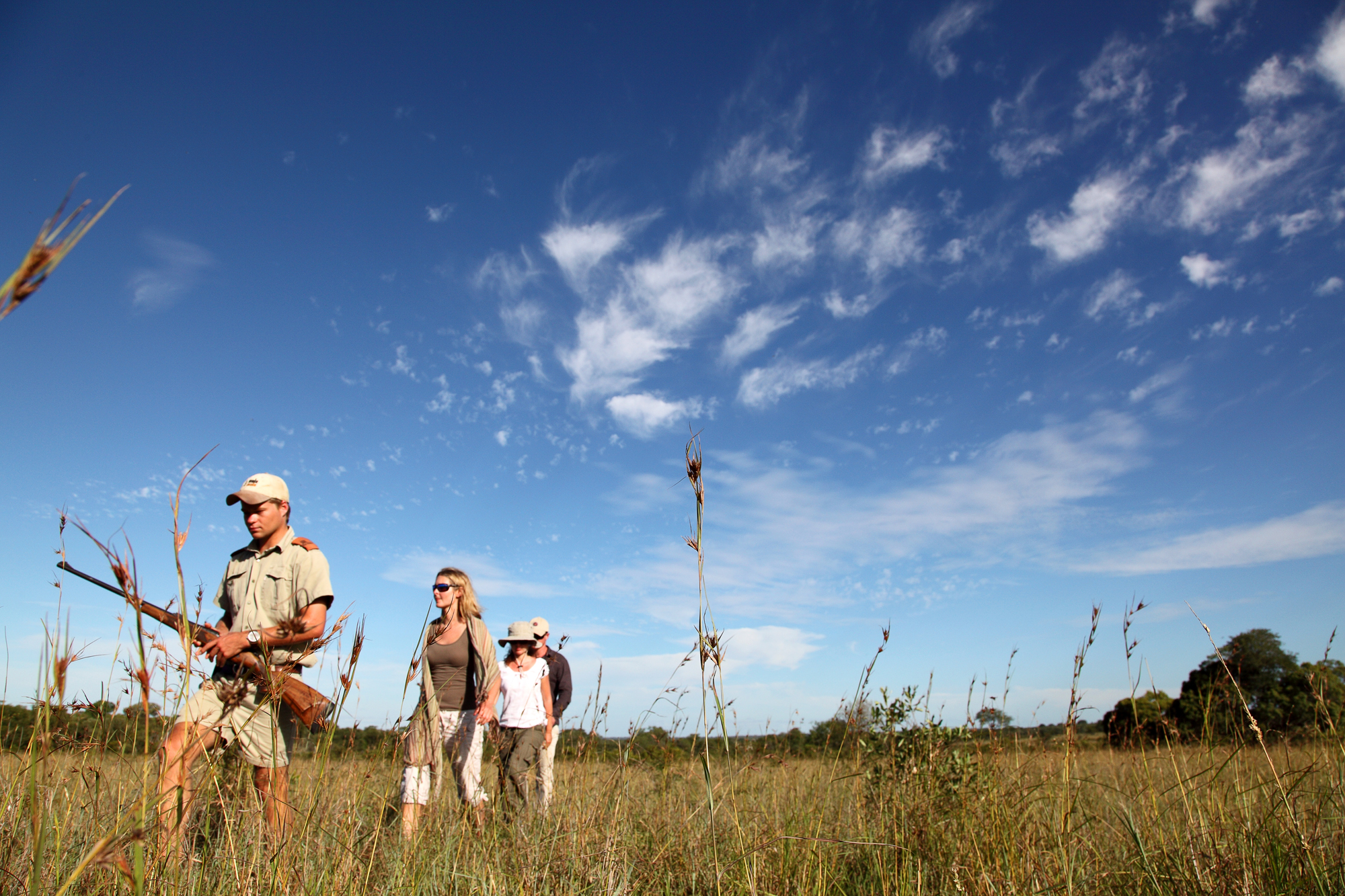 In the company of an armed ranger, visitors set out on foot to explore the wonders of MalaMala