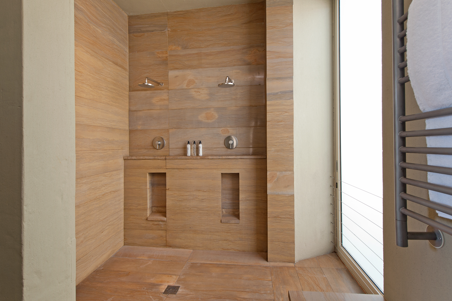 Sandstone double shower of Southern right suite