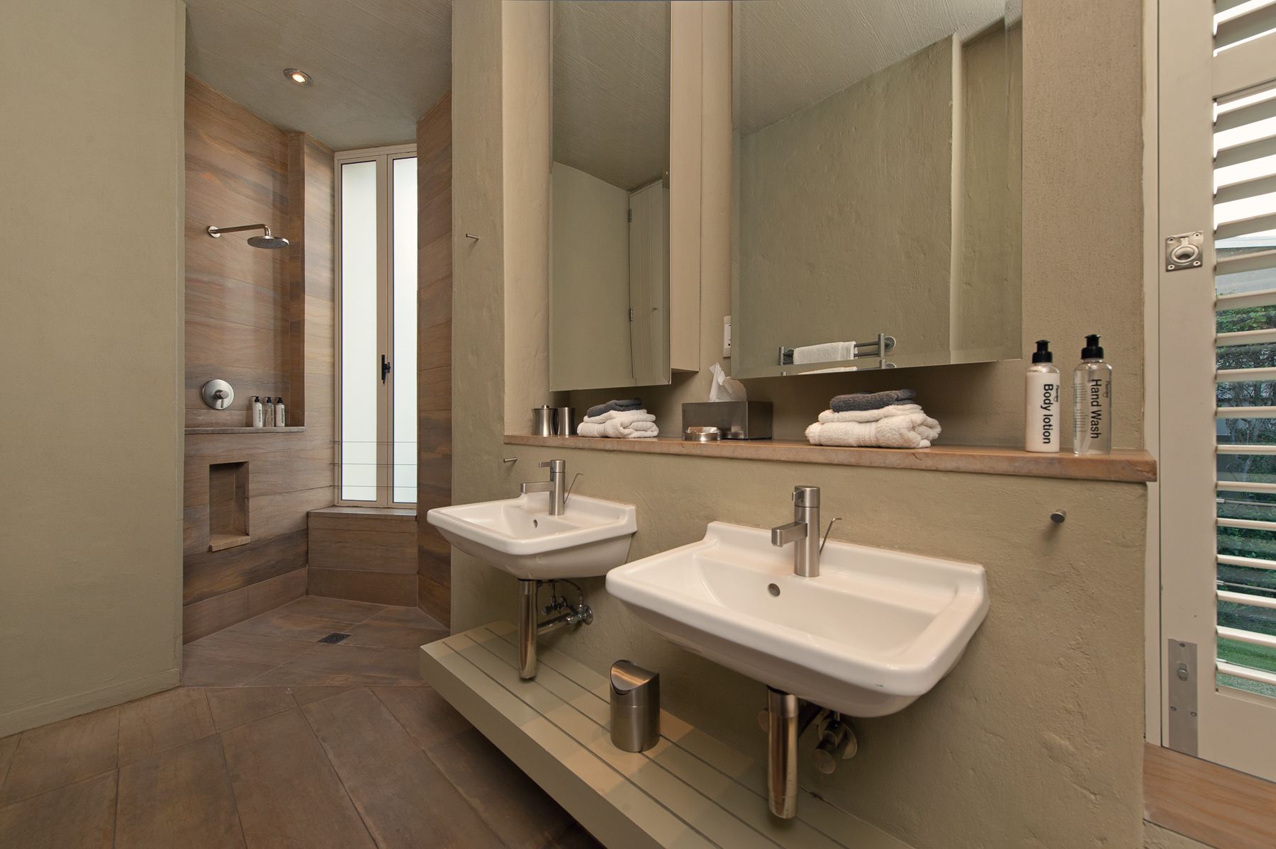 Double basins and shower with sandstone 