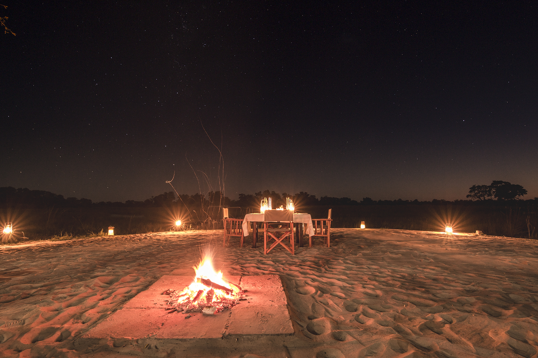 Starlit supper at the fire