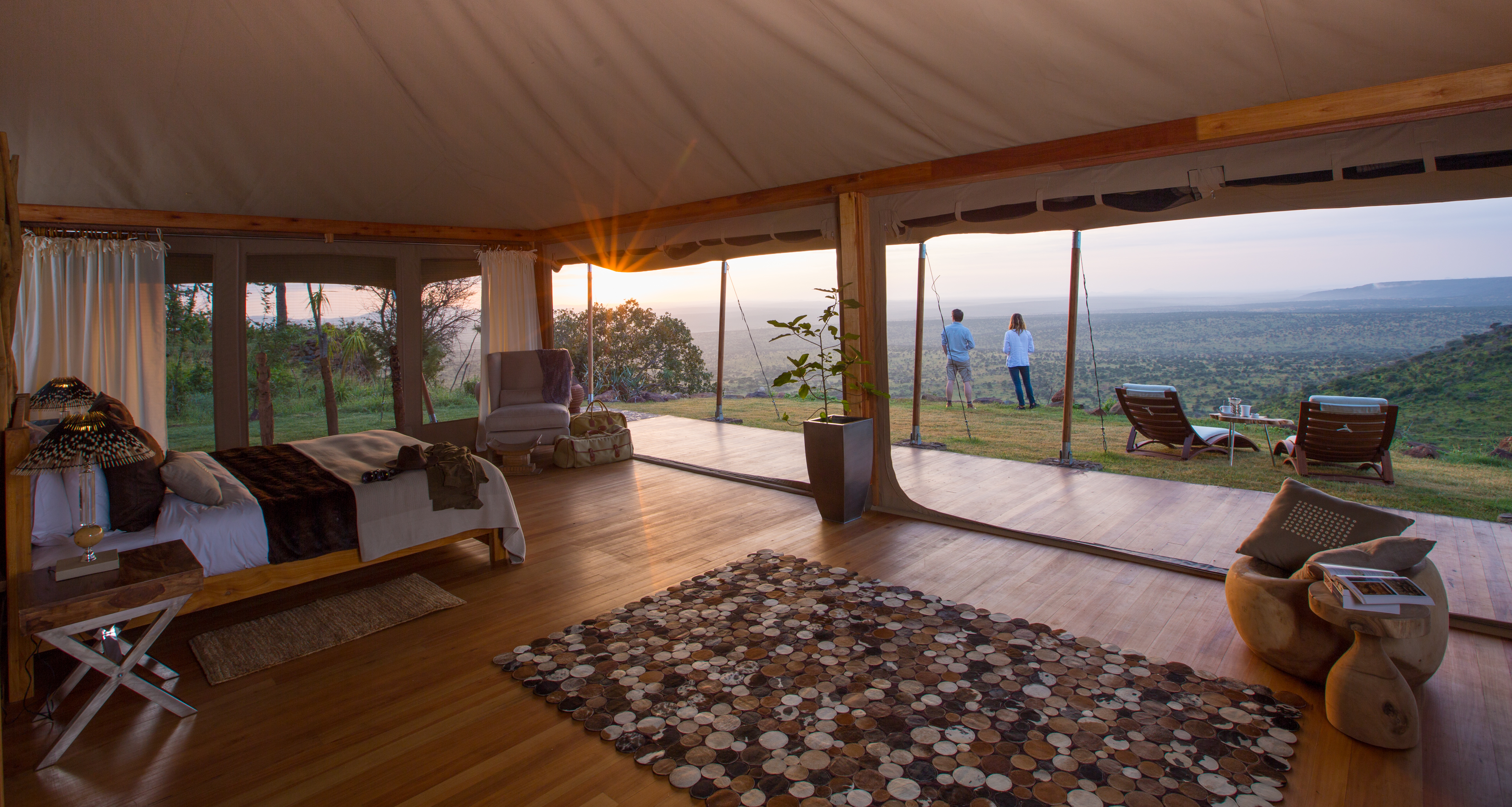 Spacious and airy tents, furnished in chic modern Africana decor