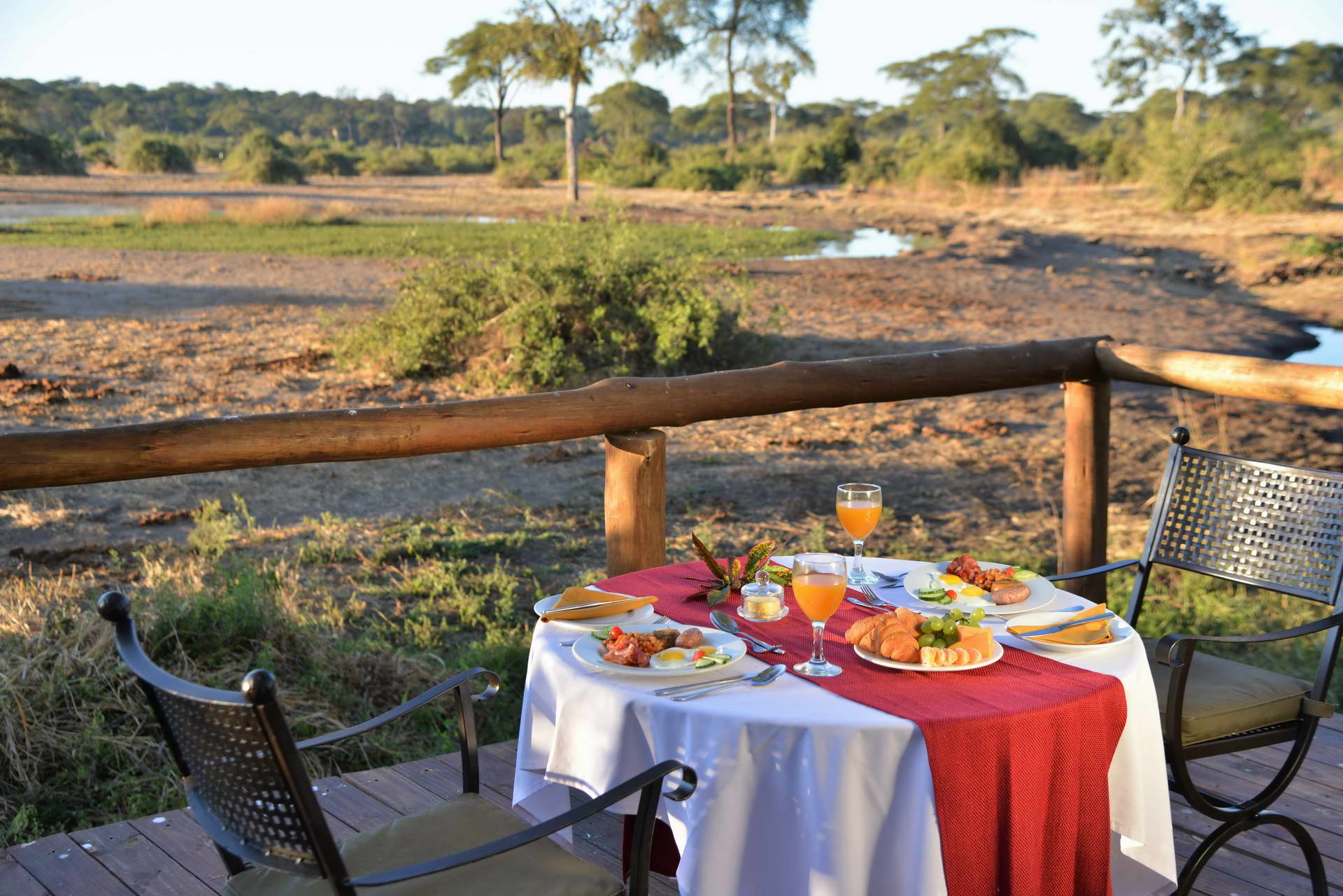 Private meal on deck overlooking waterhole