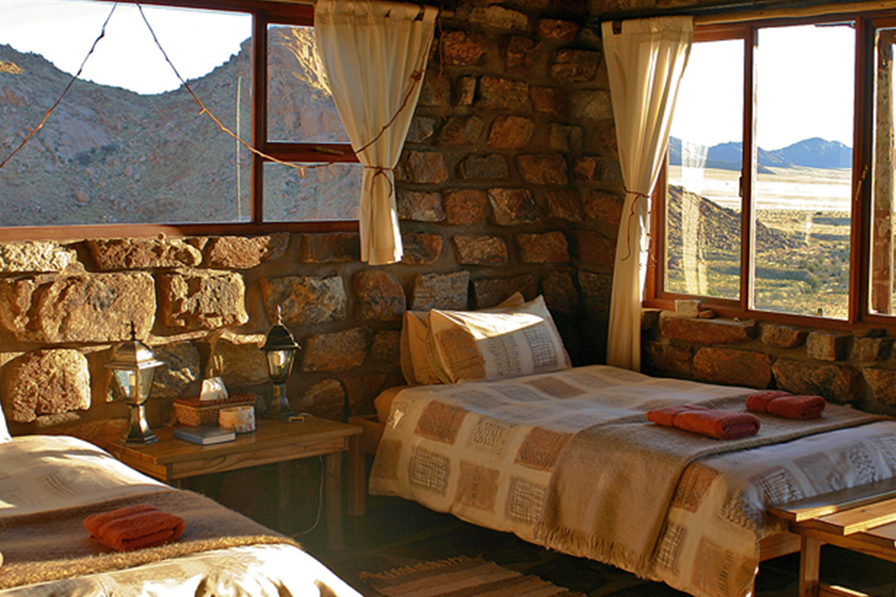 Each of the natural rock chalets sits between massive granite boulders and contains a bathroom, kitchenette, fireplace and private veranda.